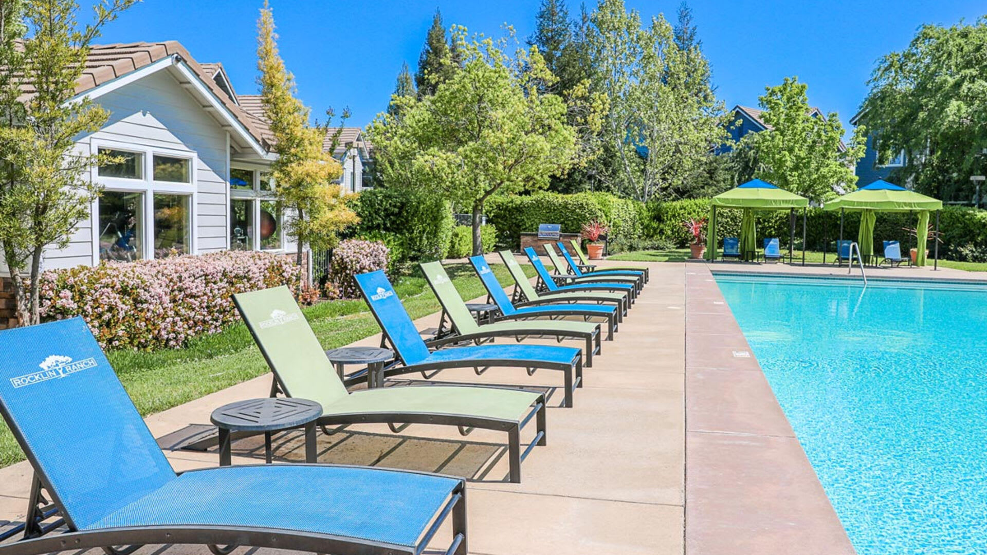 Poolside lounges at Rocklin Ranch Apartments in Rocklin, California