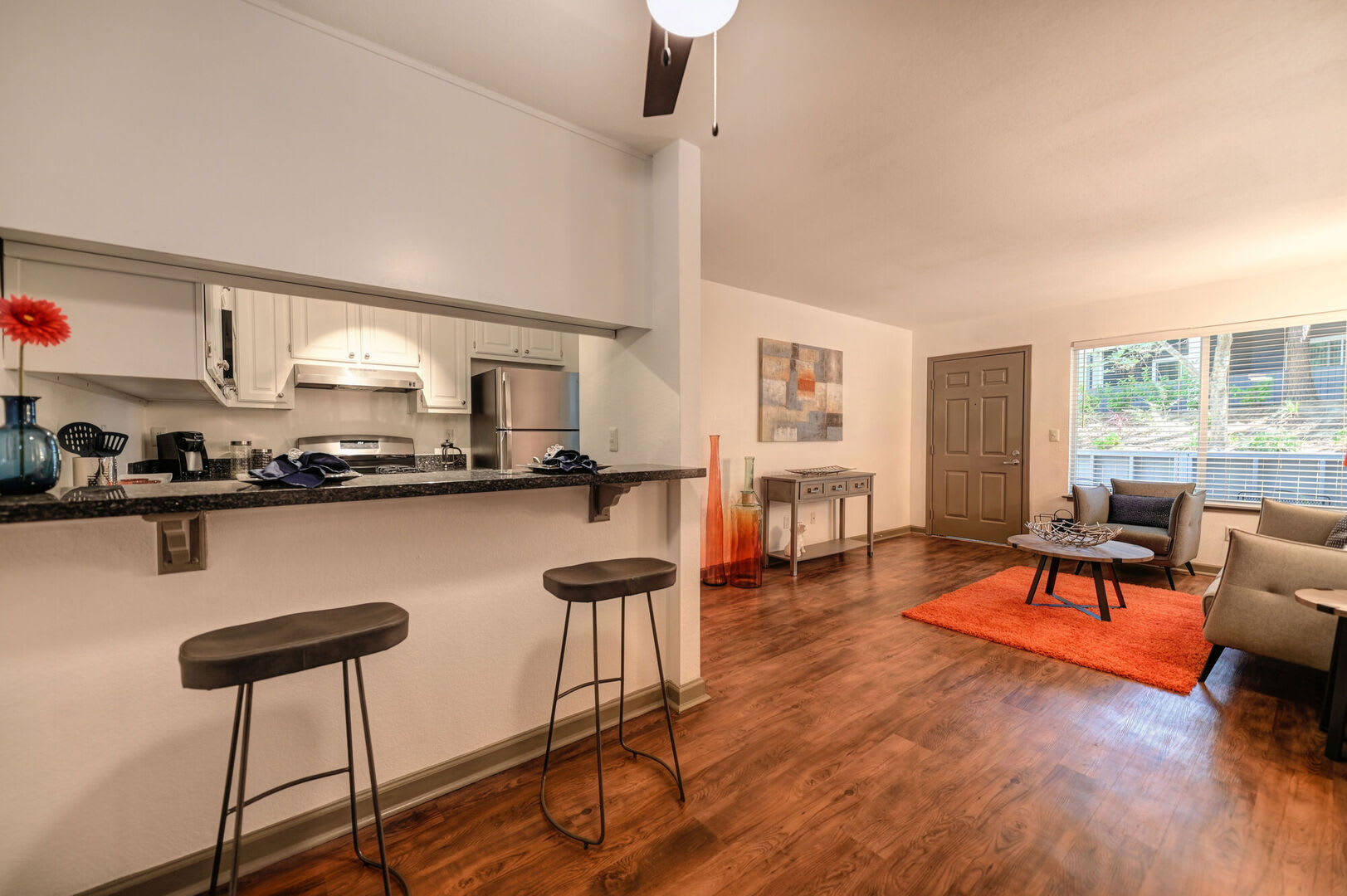 Open floor plan in a model apartment at Lake Pointe Apartments in Folsom, California