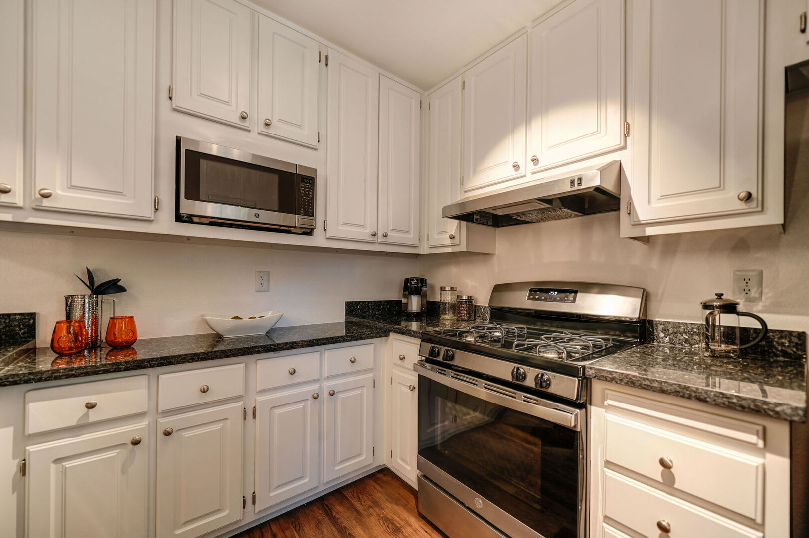 Inside view of the kitchen and modern appliances at Lake Pointe Apartments in Folsom, California