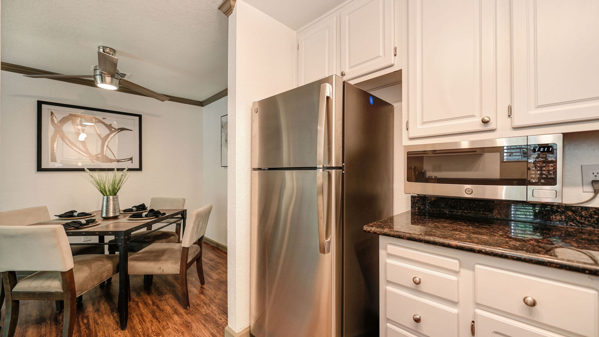Kitchen and dining room at Harbor Oaks Apartments in Sacramento, California