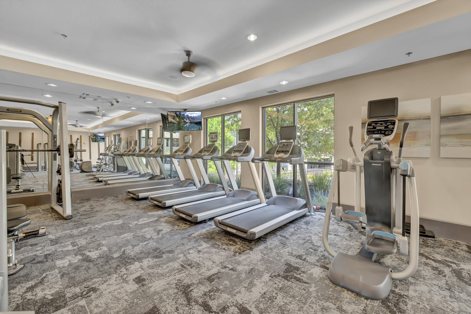 Exercise room with treadmills at Henley at The Rim in San Antonio, Texas