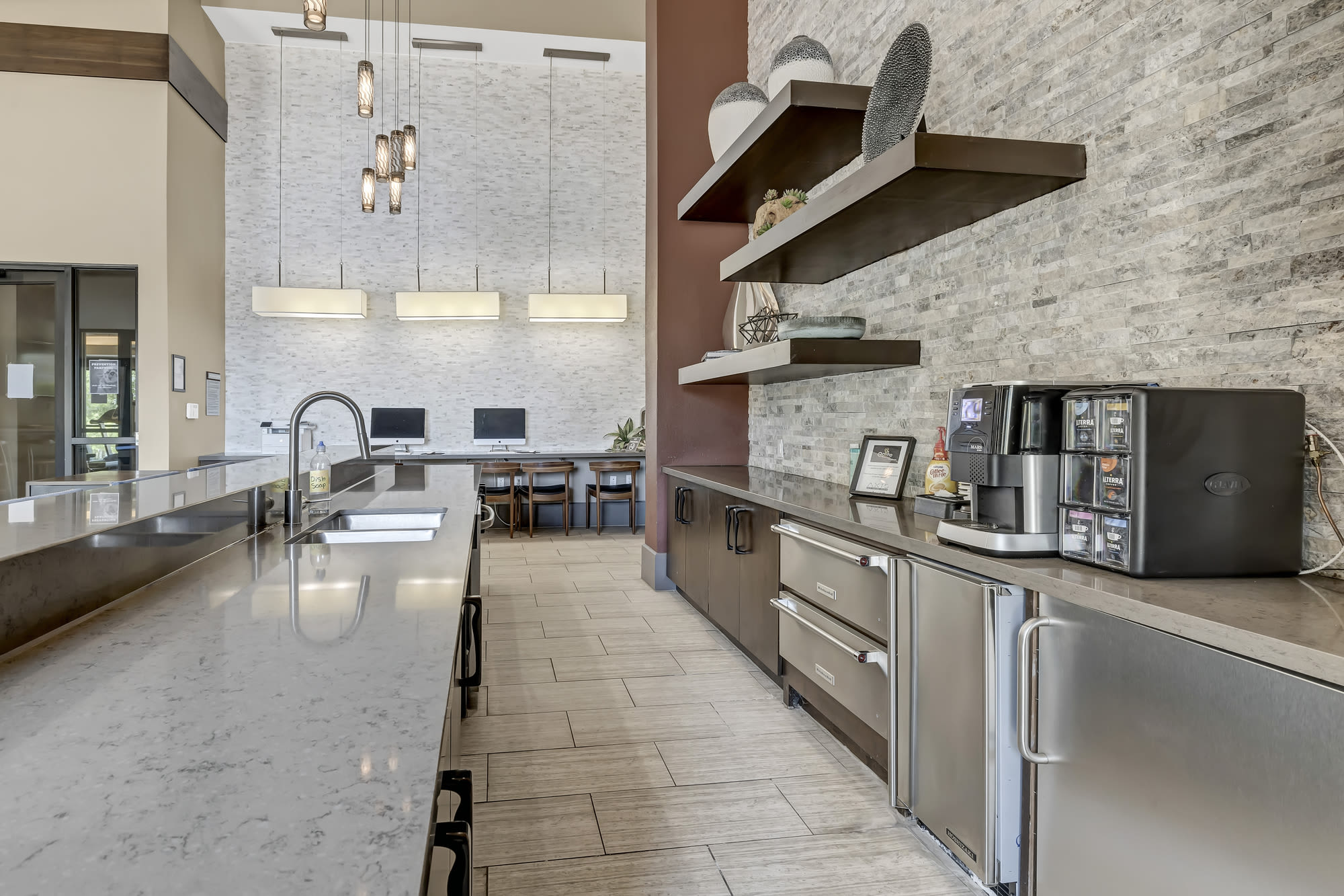 Coffee bar and modern conveniences in clubhouse at Henley at The Rim in San Antonio, Texas