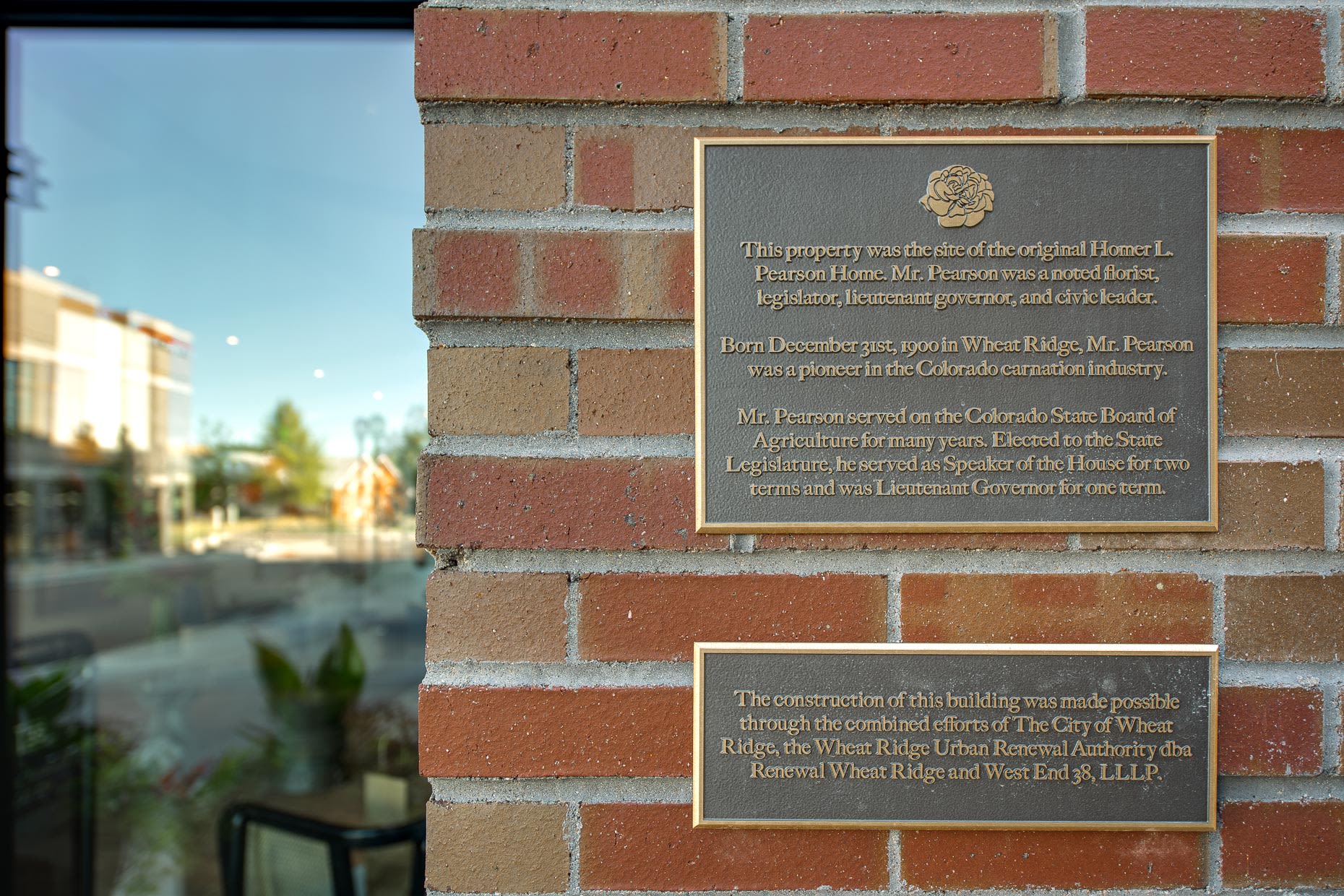 Historical plaque on the exterior at West 38 in Wheat Ridge, Colorado