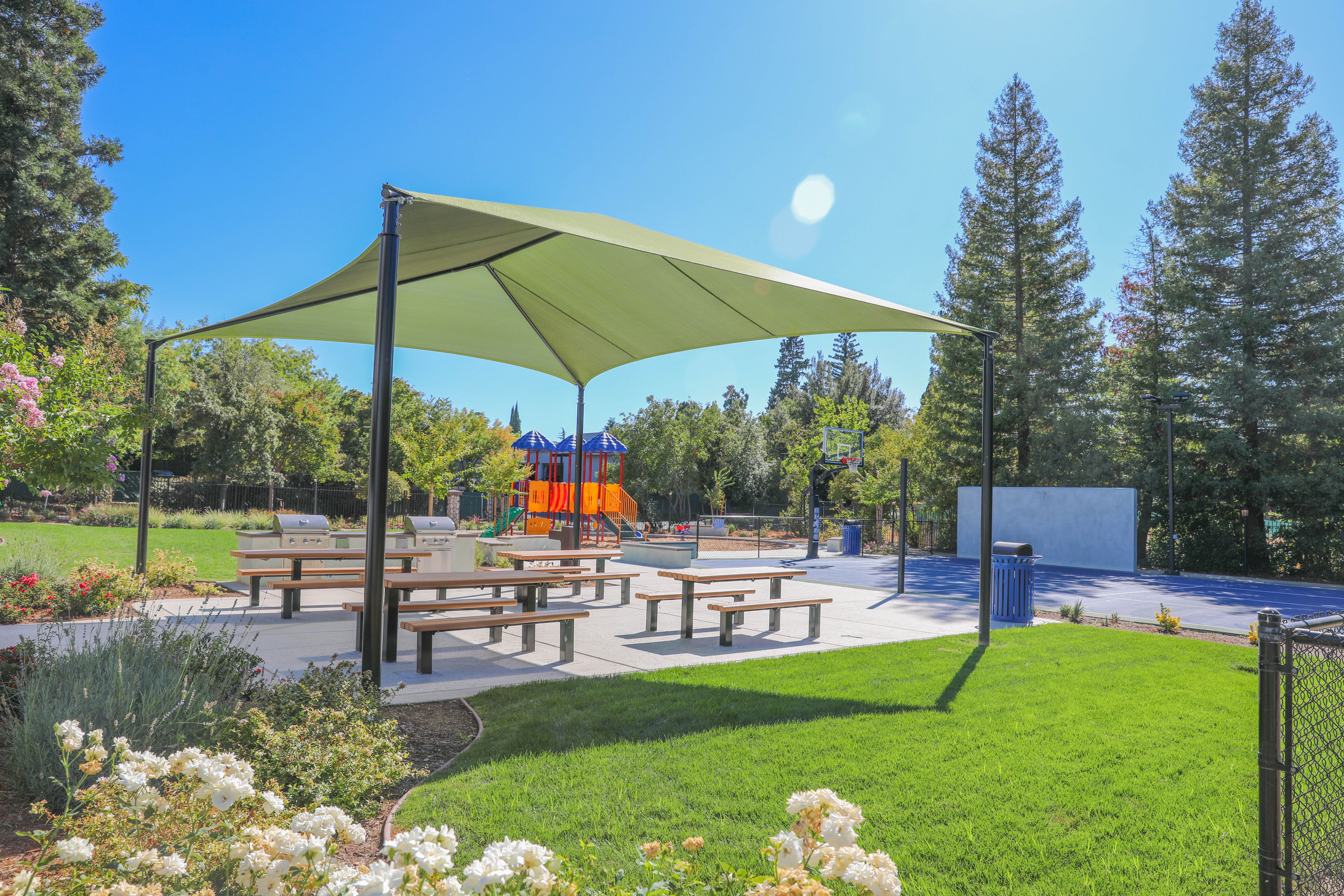 Shaded outdoor seating at Salishan Apartments in Citrus Heights, California