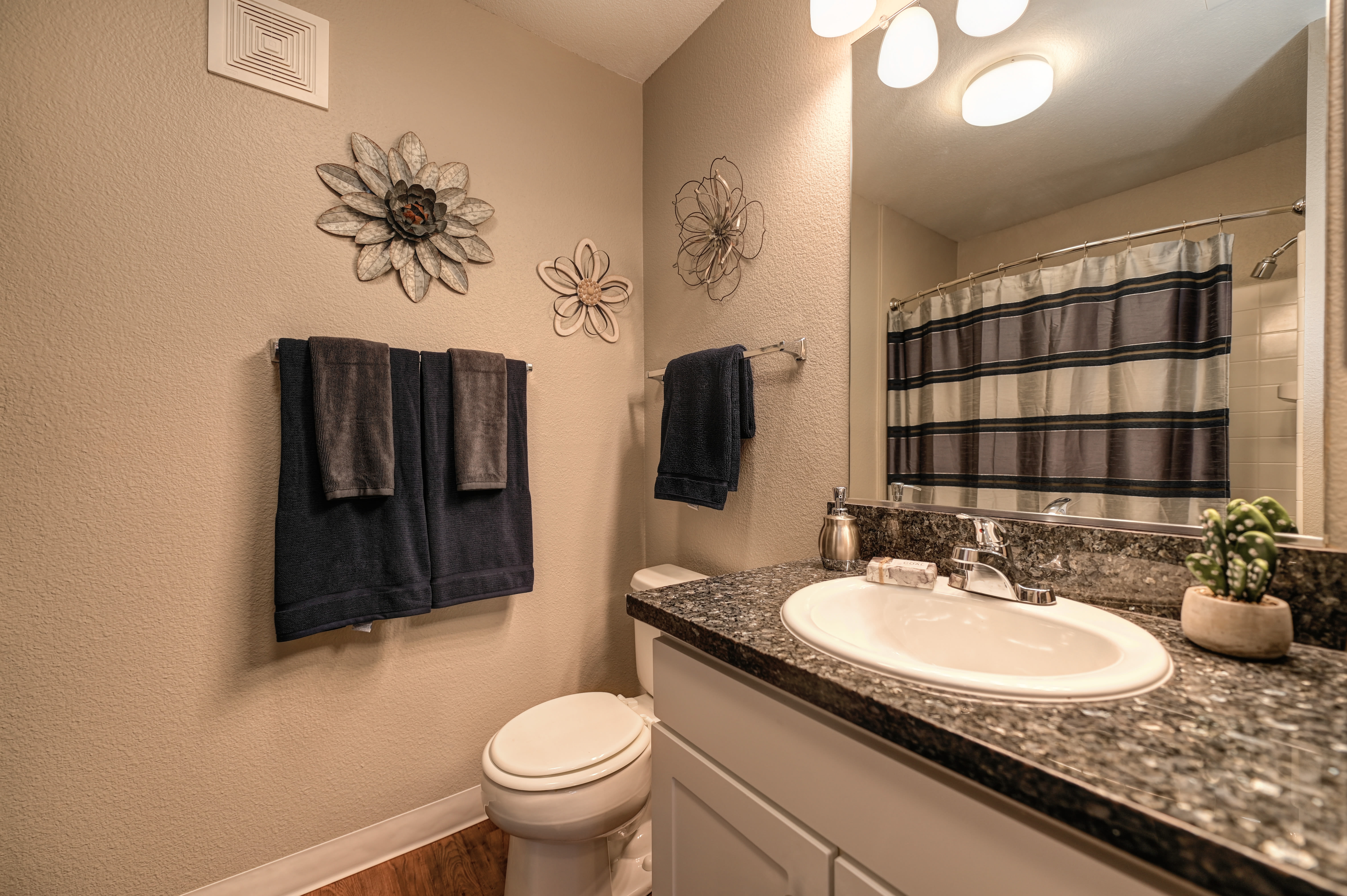 Bathroom with granite counter tops at Rocklin Ranch Apartments in Rocklin, California