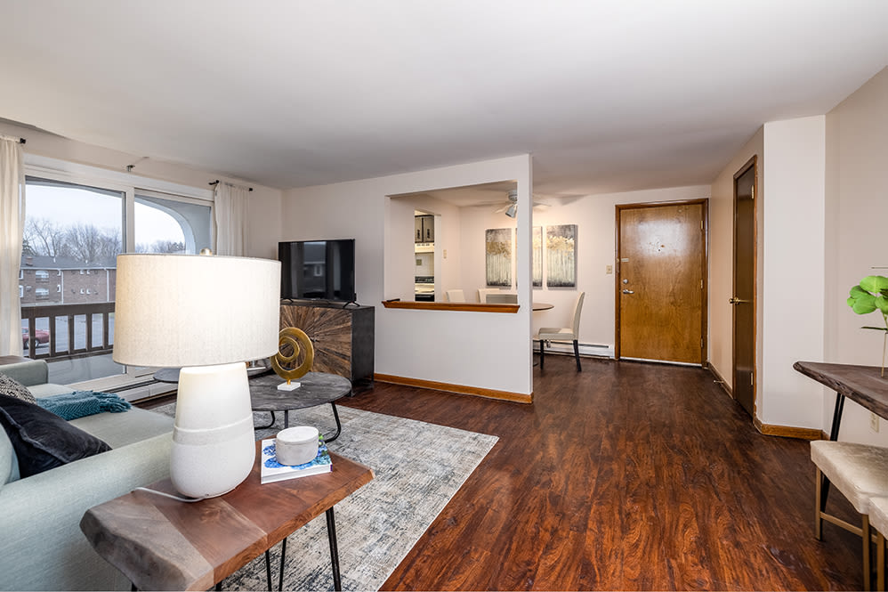 Spacious living room at Raintree Island Apartments in Tonawanda, New York