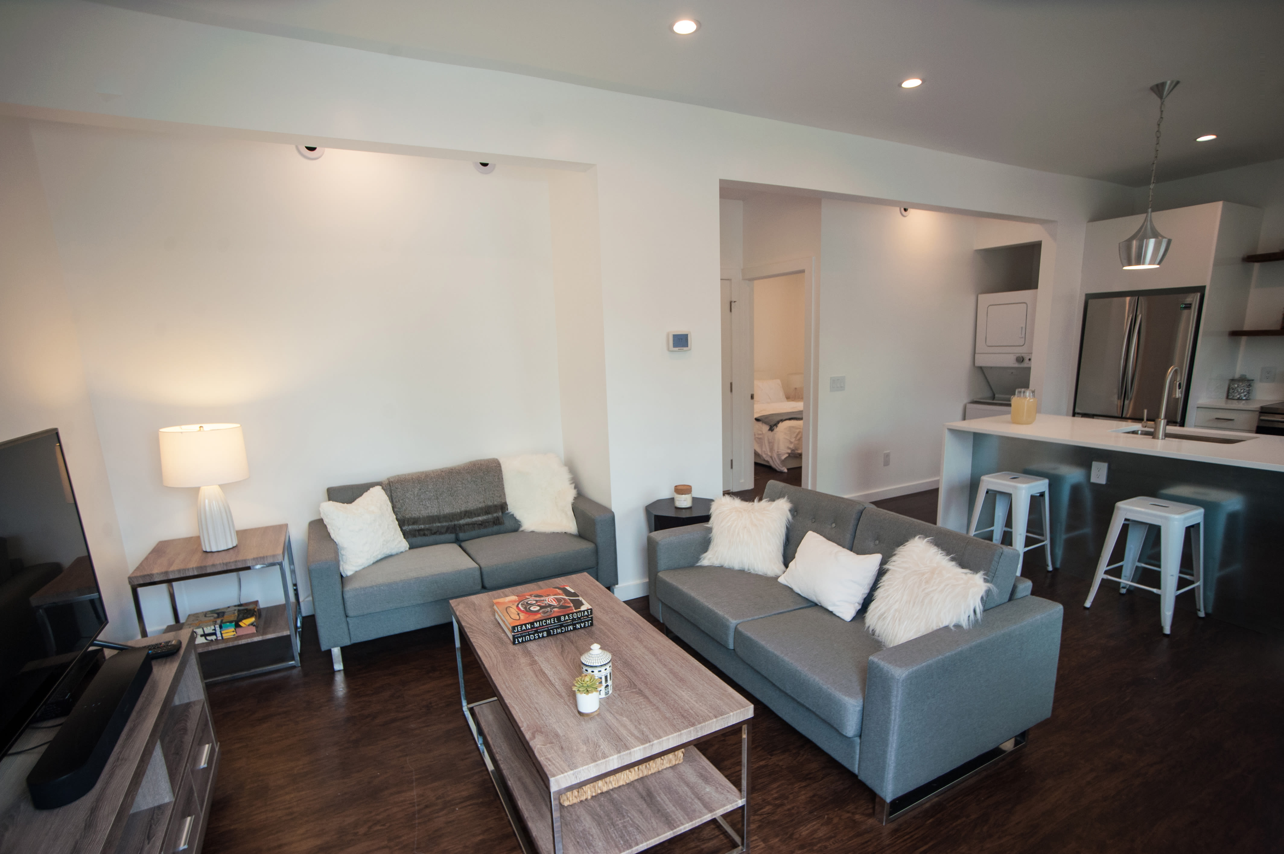 Fully furnished and living room in the student apartments at Campus Prime in Syracuse, New York