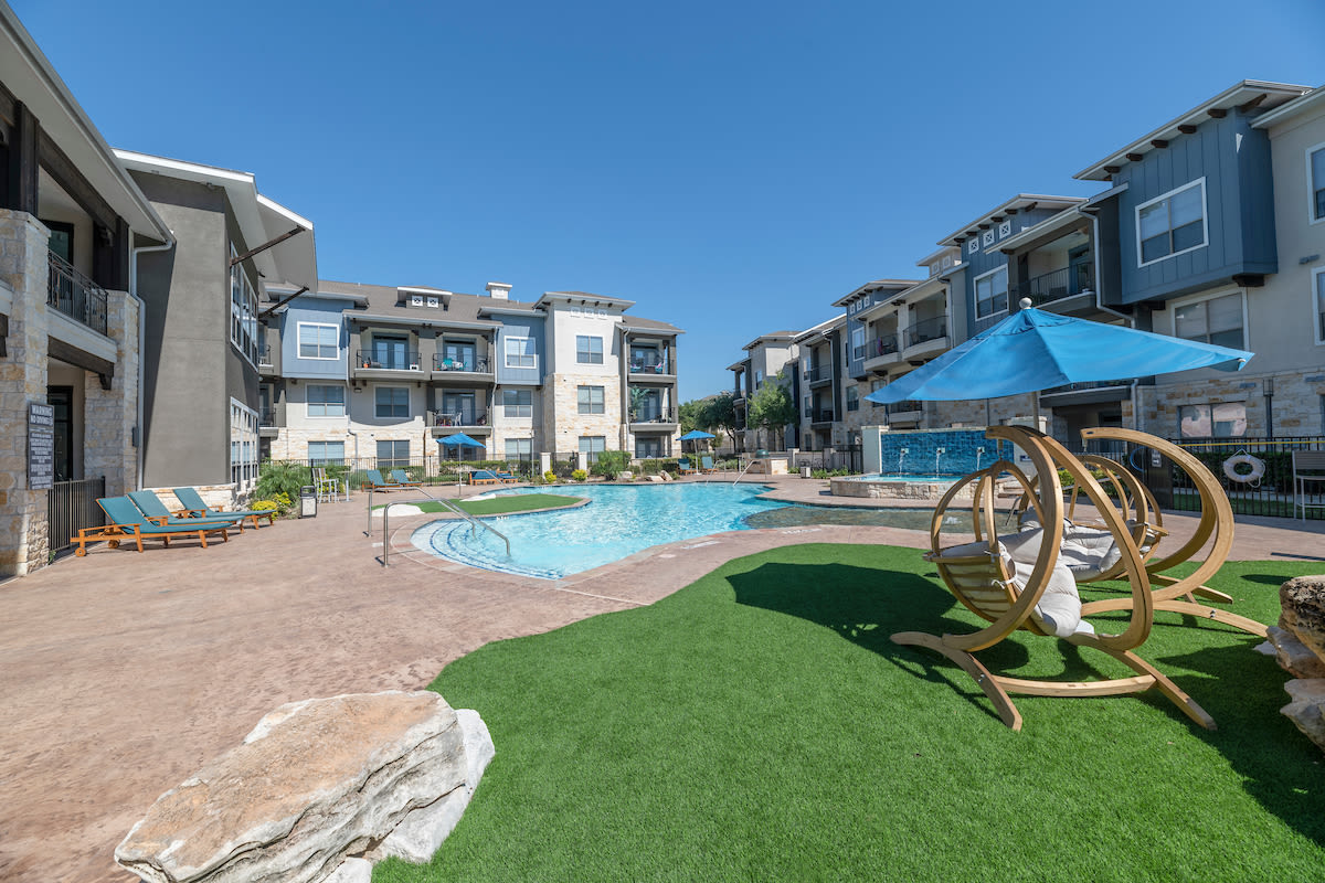 Pool and lawn chairs at Cantera at Towne Lake in Cypress, Texas
