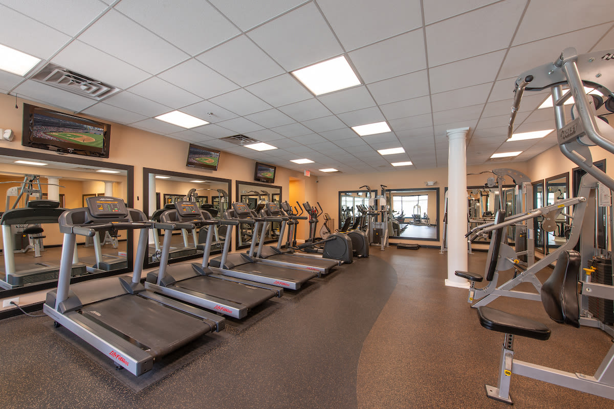 State-of-art fitness center with televisons at The Elms at Stoney Run Village in Hanover, Maryland