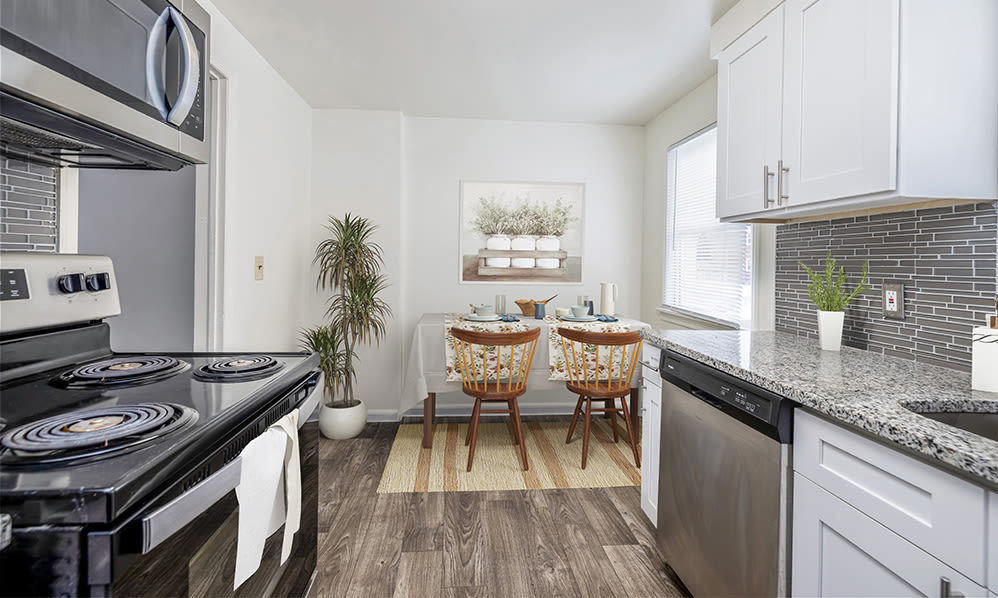 Kitchen with black appliance at Park Place Townhomes in Buffalo, New York