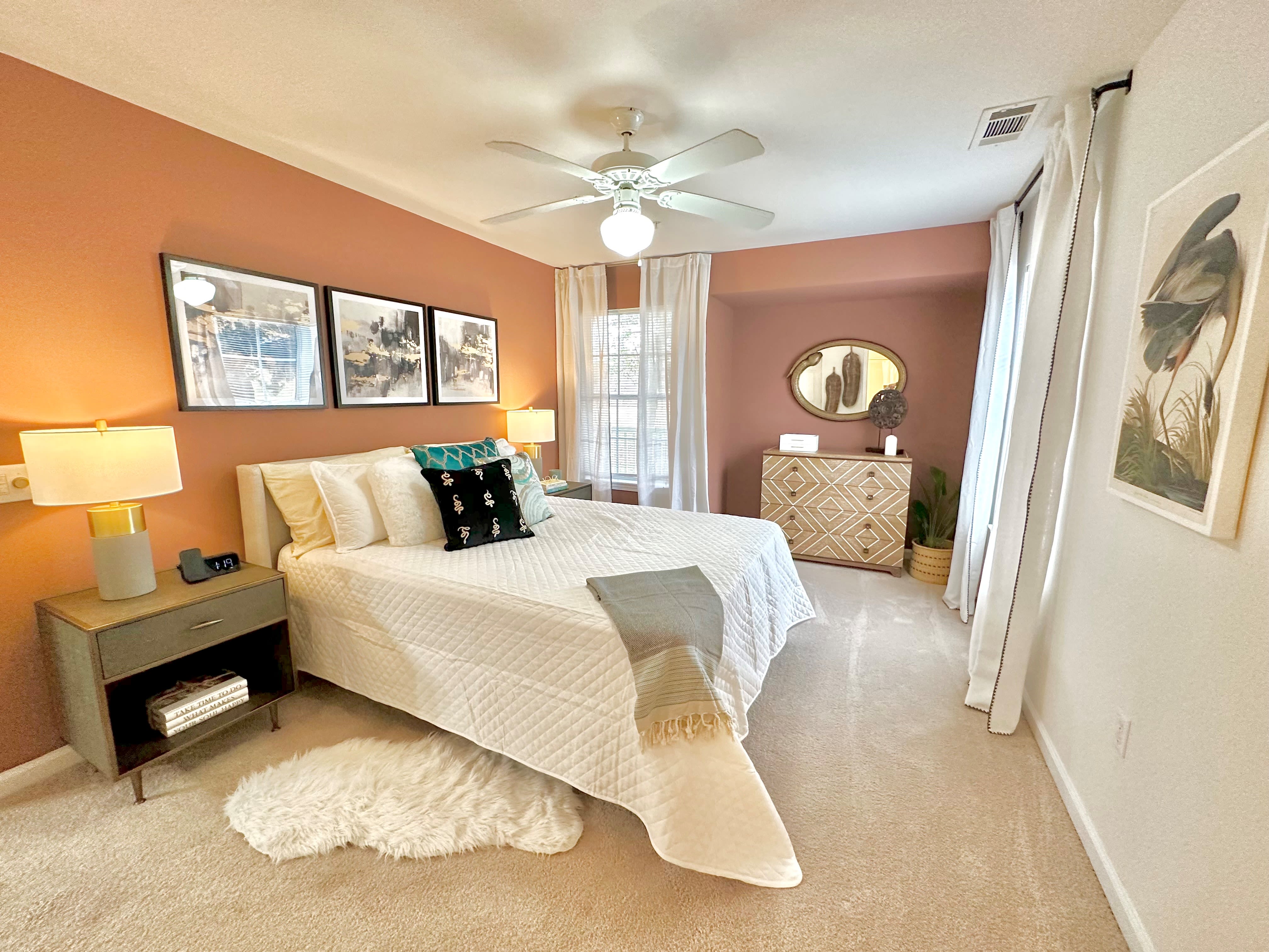Spacious master bedroom with plush carpeting at Glade Creek Apartments in Roanoke, Virginia