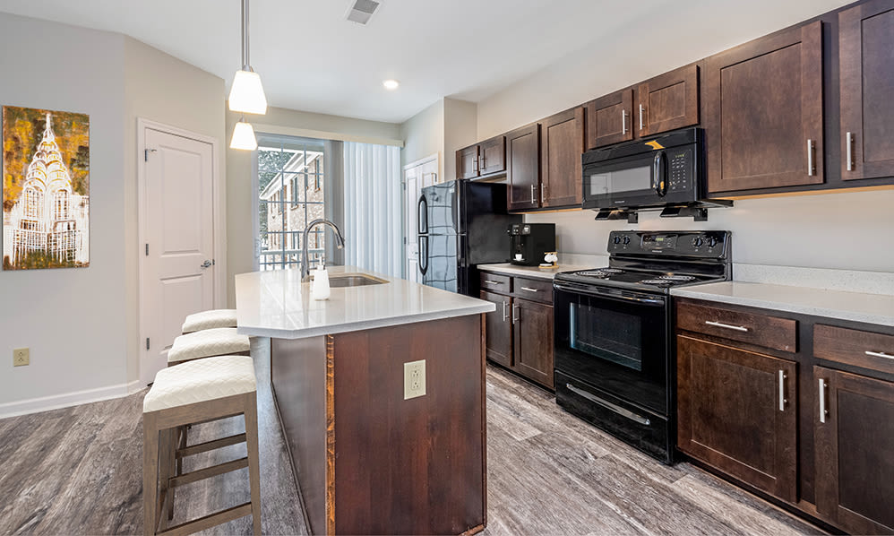 Large kitchen with center island at Green Lake Apartments & Townhomes in Orchard Park, New York