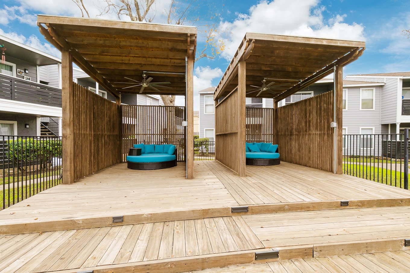 Wooden cabana next to the pool at Silvermine in Victoria, Texas