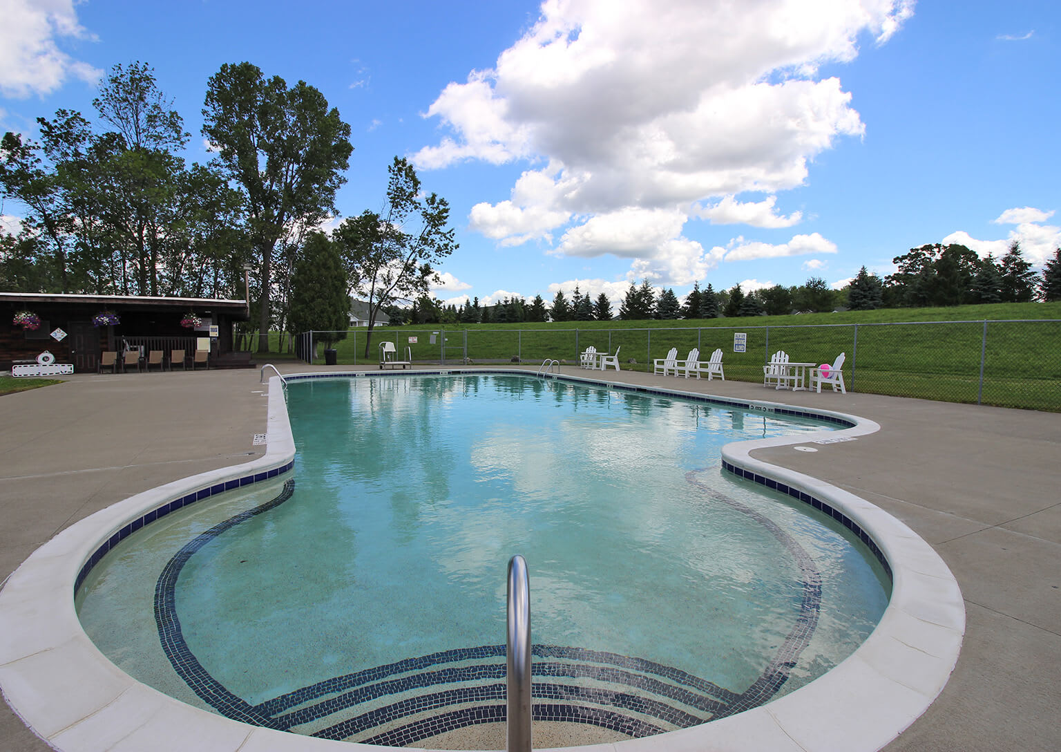 Inviting pool on a nice day at Lake Shore Park Apartments in Watervliet, New York