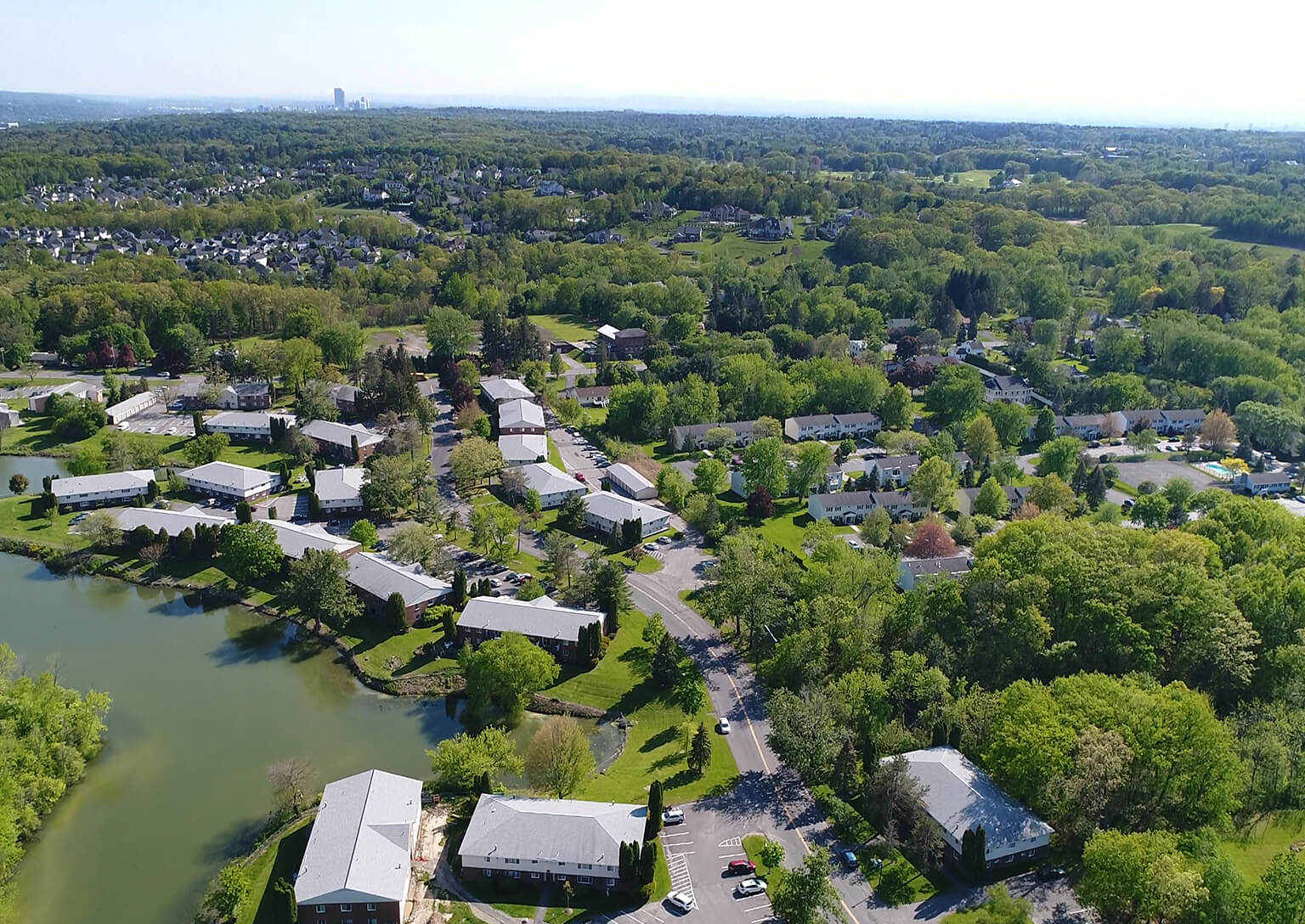Ariel view of spacious and green property at Lake Shore Park Apartments in Watervliet, New York