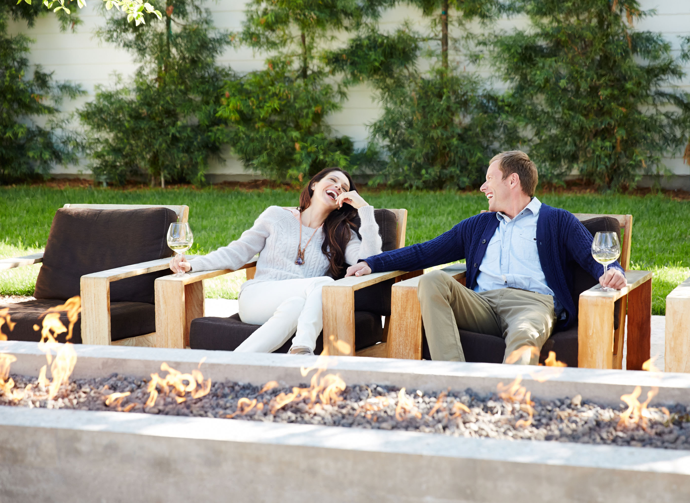 Residents meeting by the fire at The Mark by Solaire in Alexandria, Virginia