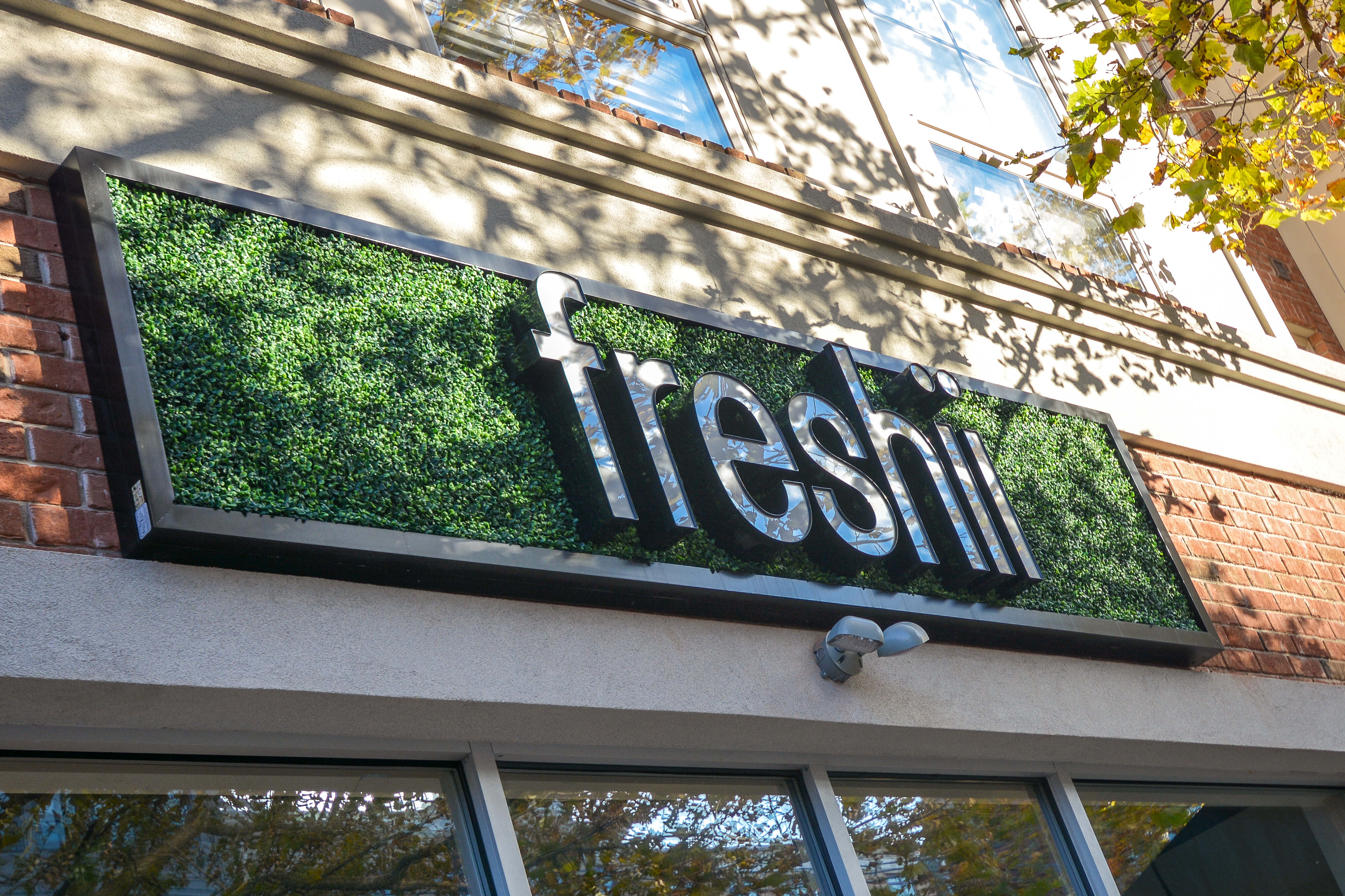 Sign for a store called freshii near The Brunswick in New Brunswick, New Jersey