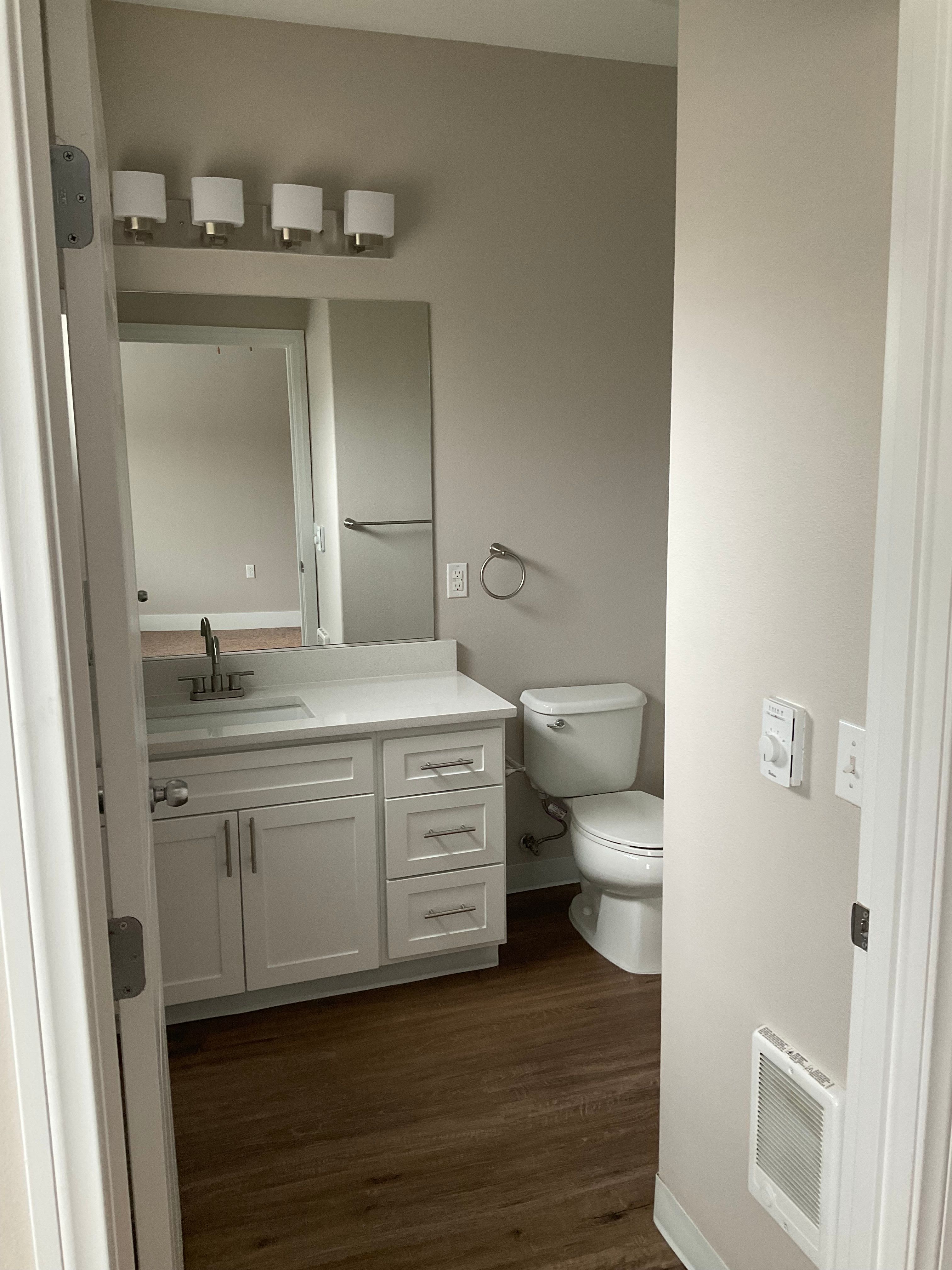 Enjoy our Beautiful Apartments Bathroom at Woodland Apartments in Olympia, Washington