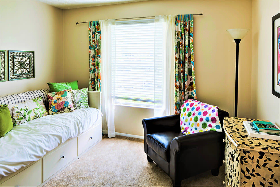 Spare bedroom with a chair at St. Andrews and The Villas at Little Turtle in Westerville, Ohio