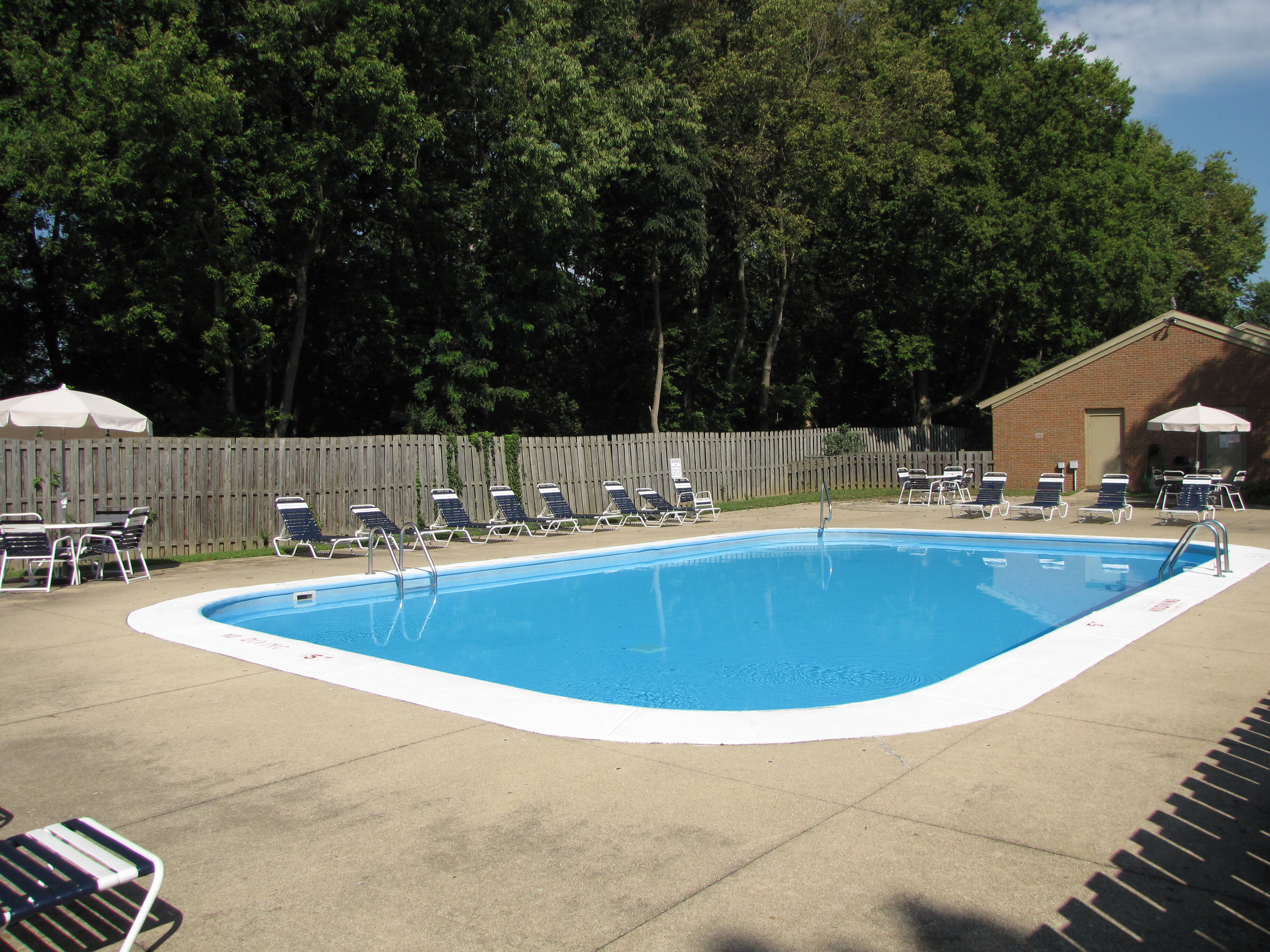 On-site pool with lounge chairs at North River Place in Chillicothe, Ohio