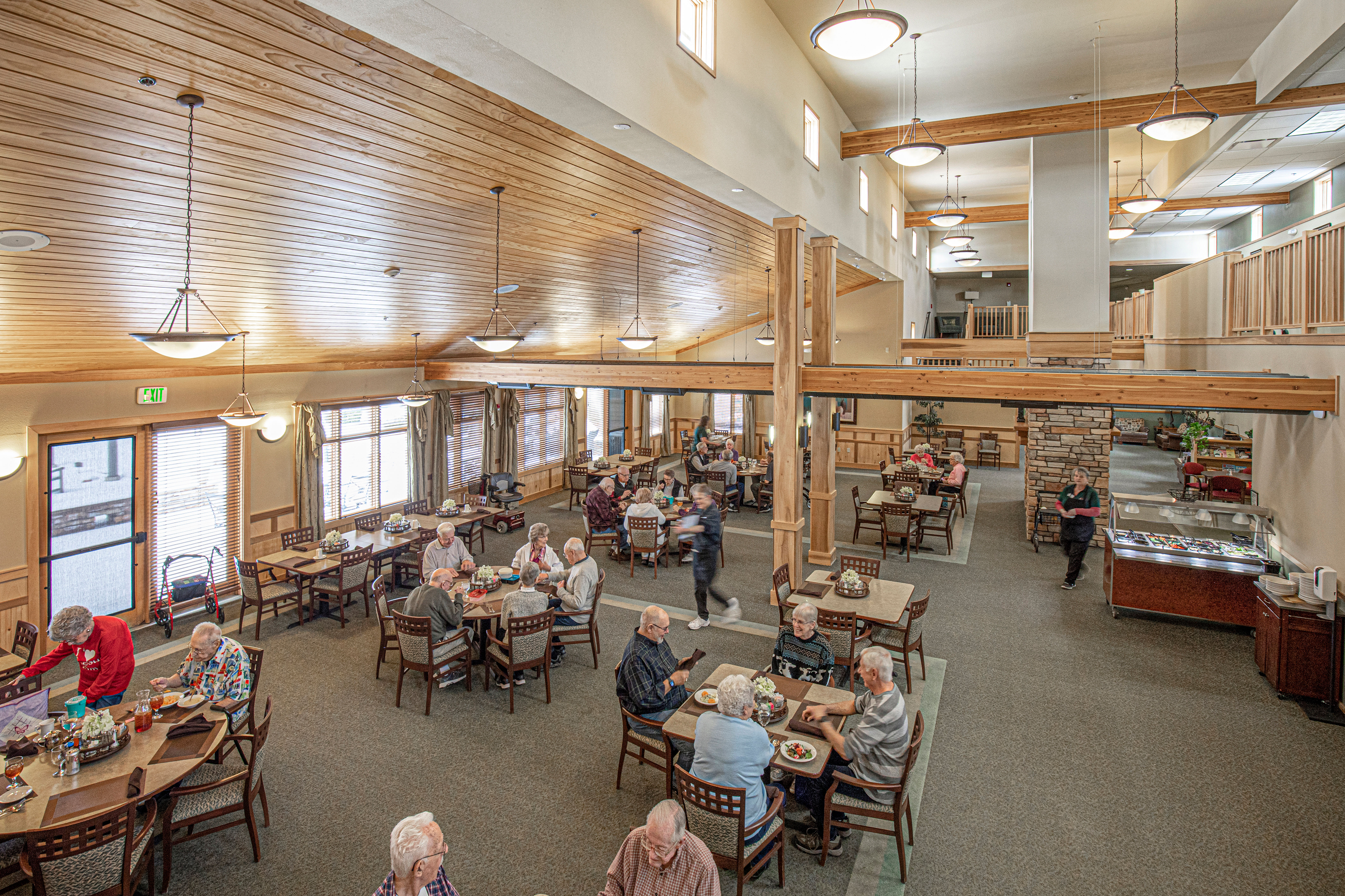Well lit communal dining hall at Majestic Rim Retirement Living in Payson, Arizona. 