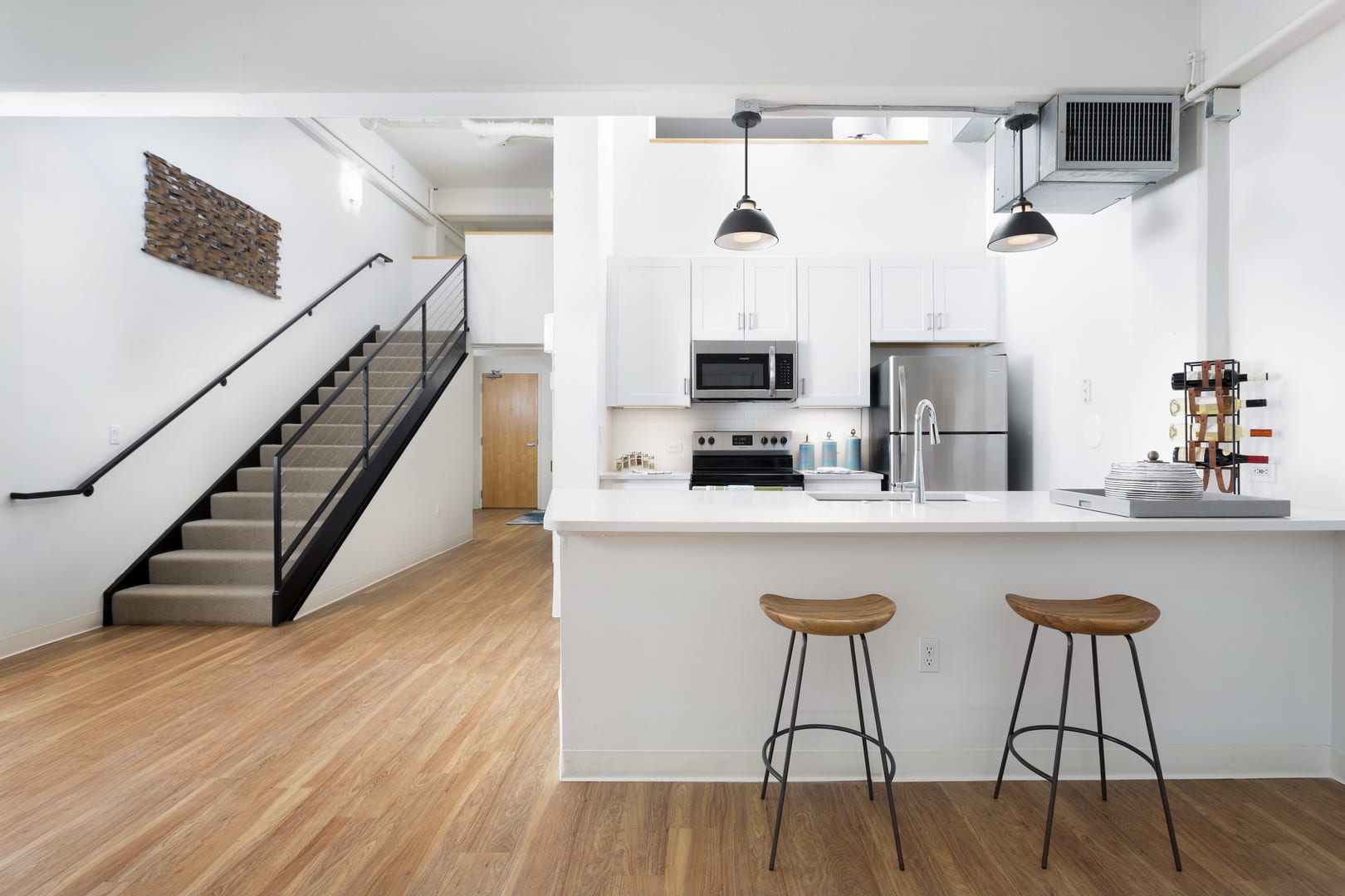 Fully equipped kitchen at Grand Lowry Lofts in Denver, Colorado