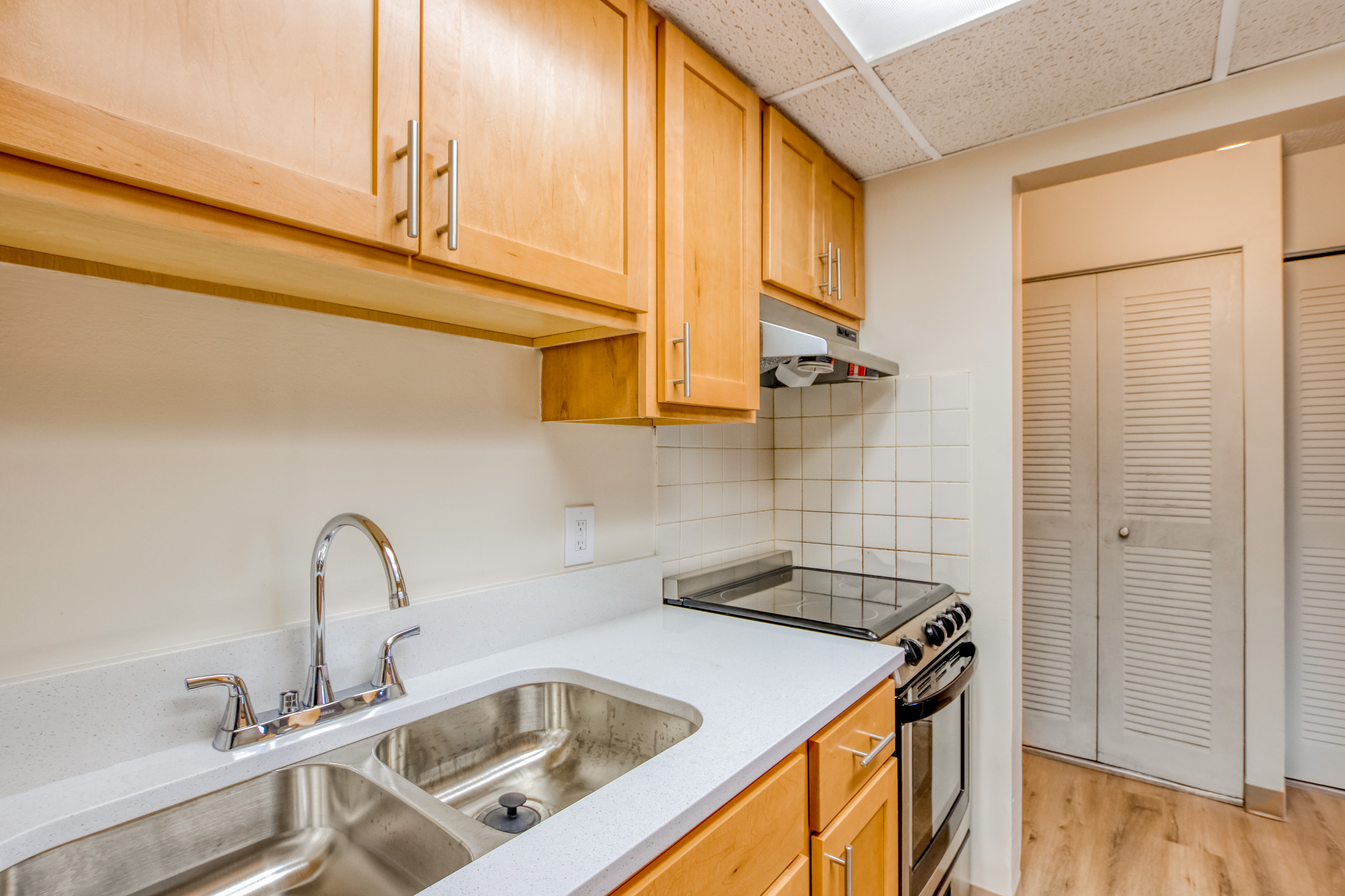 Fully equipped kitchen with garbage disposal at Bowin Place in Detroit, Michigan