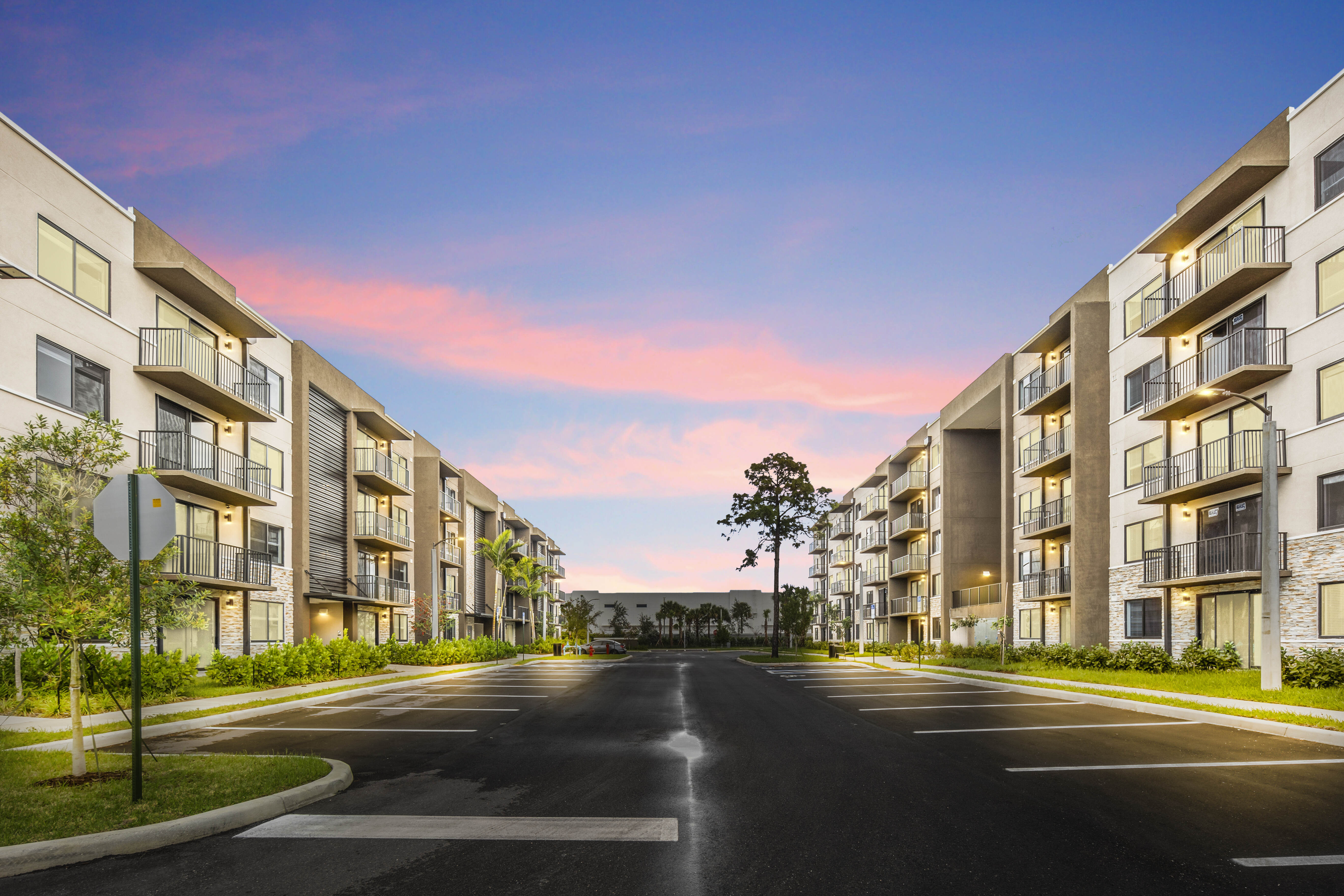 Sunset view from the ground of the apartments at Pine Ridge in West Palm Beach, Florida