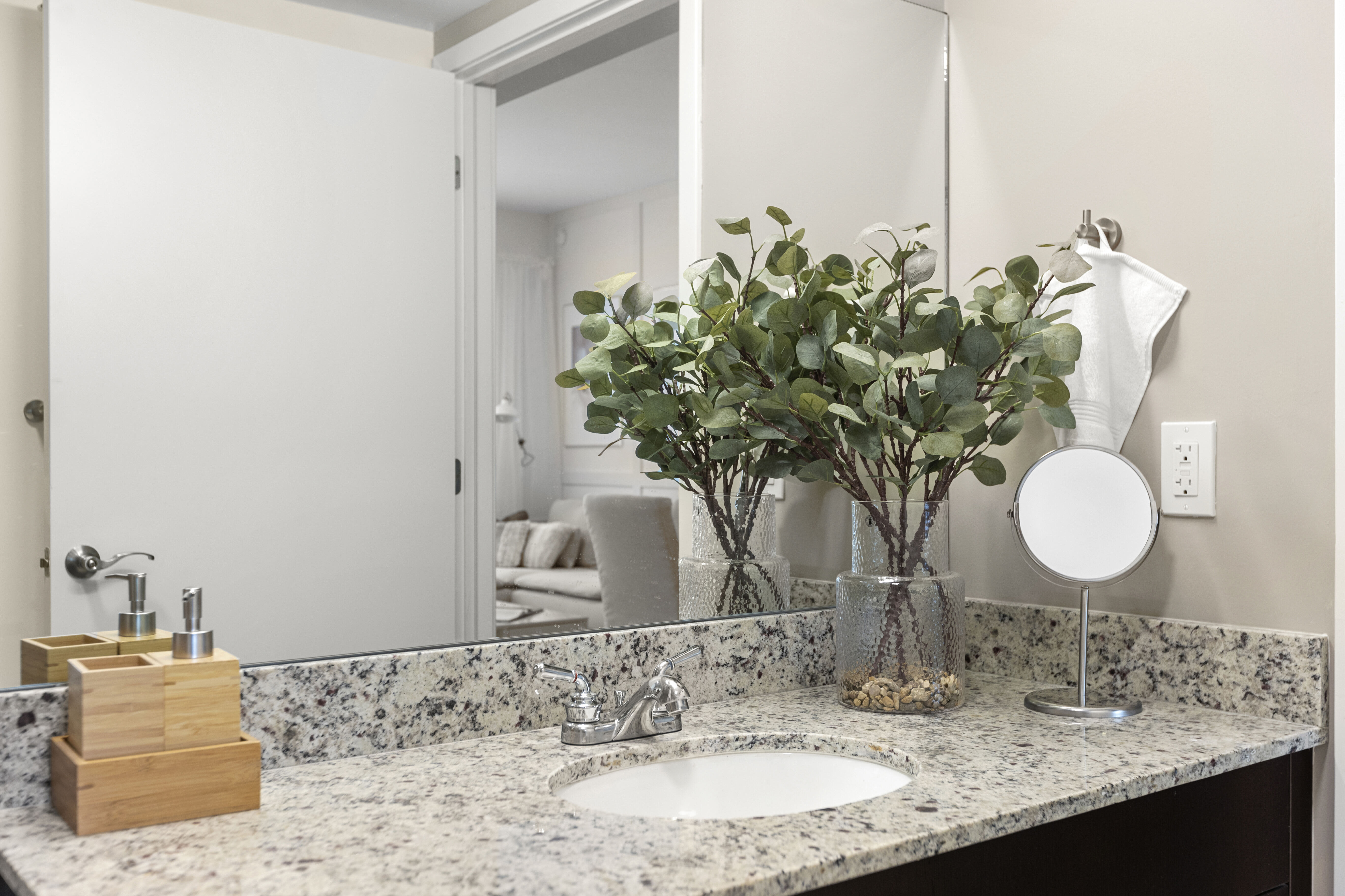 Granite counters in a model bathroom at Pine Ridge in West Palm Beach, Florida