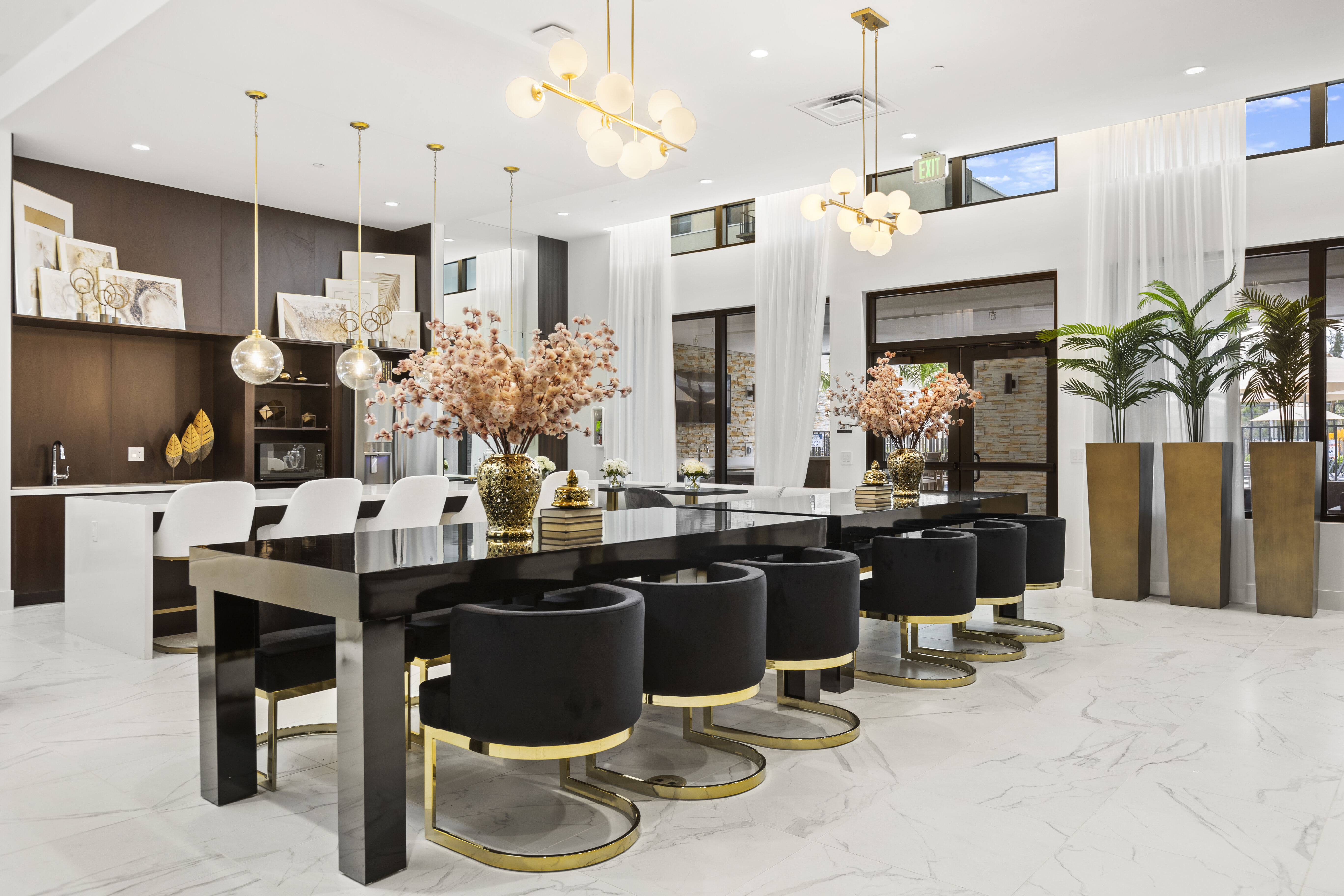 Luxurious clubhouse with high-end lighting, modern furnishings, and inviting seating at Pine Ridge, West Palm Beach, Florida