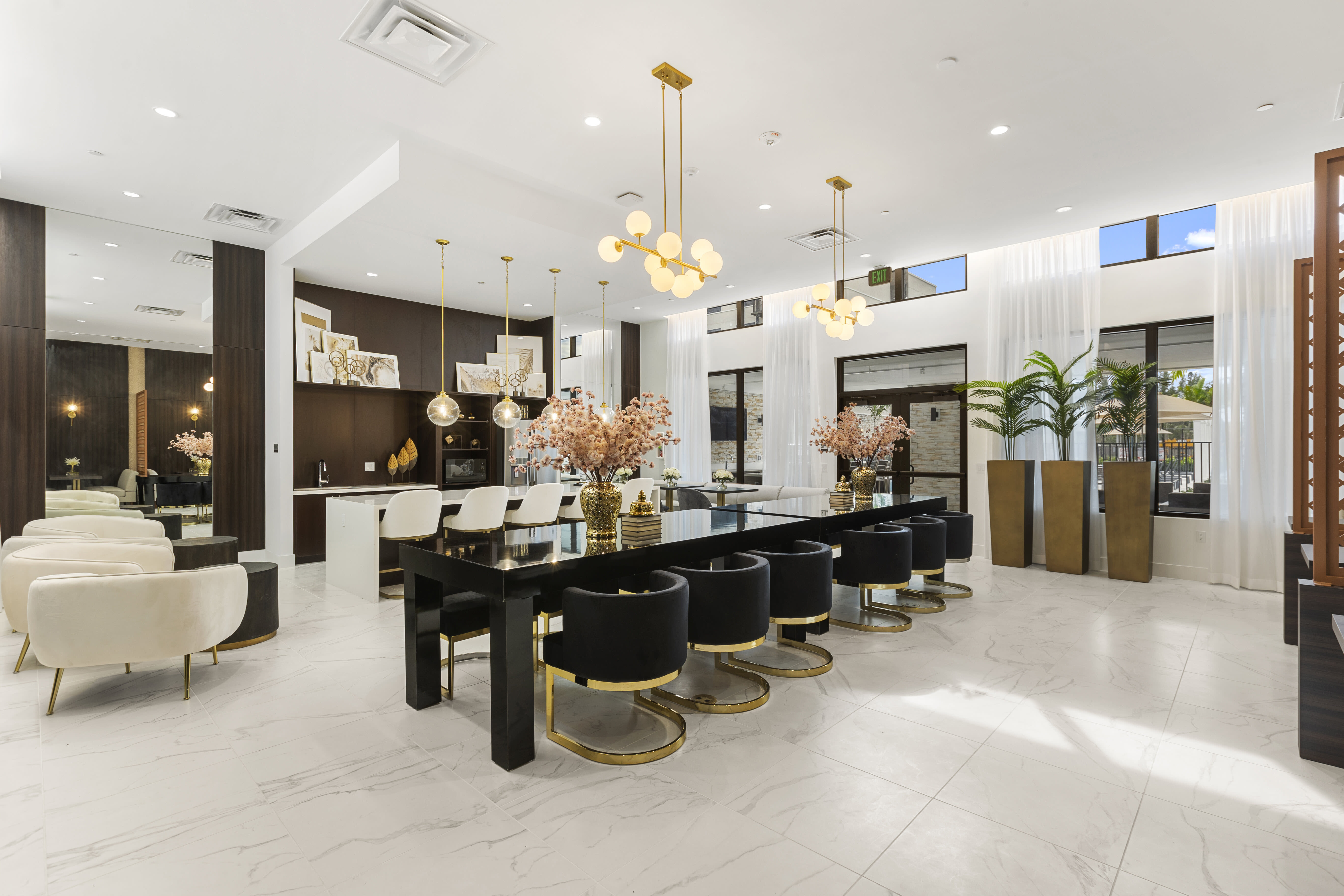 Luxurious clubhouse with high-end lighting, inviting seating, and modern furnishings at Pine Ridge, West Palm Beach, Florida