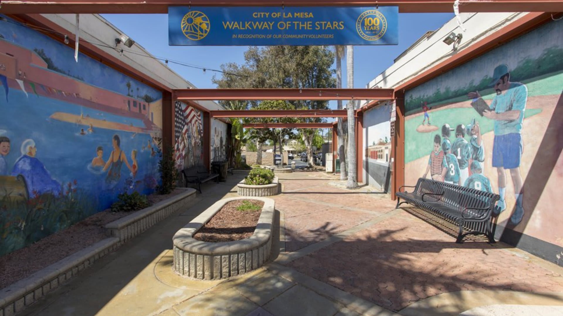 Courtyard with murals at The Quarry Apartments in La Mesa, California