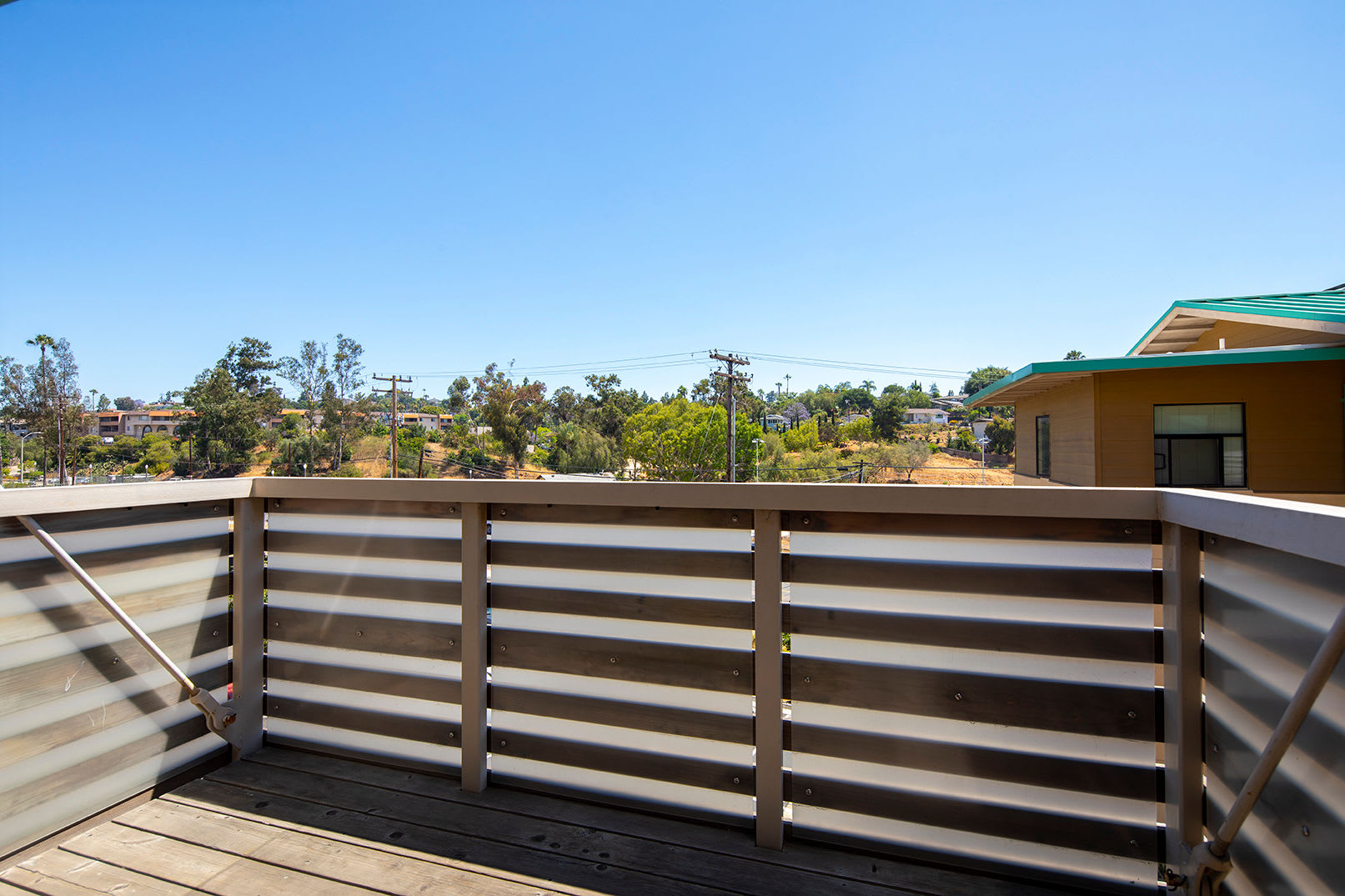 Balcony overlooking the city at The Quarry Apartments in La Mesa, California