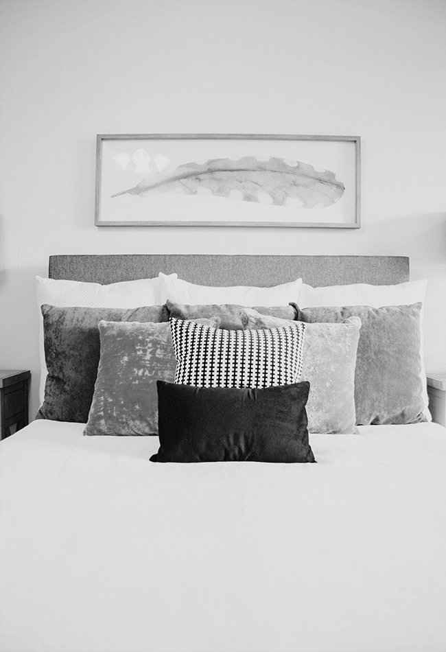 Beds with lots of pillows at Inscription West Palm Beach in West Palm Beach, Florida