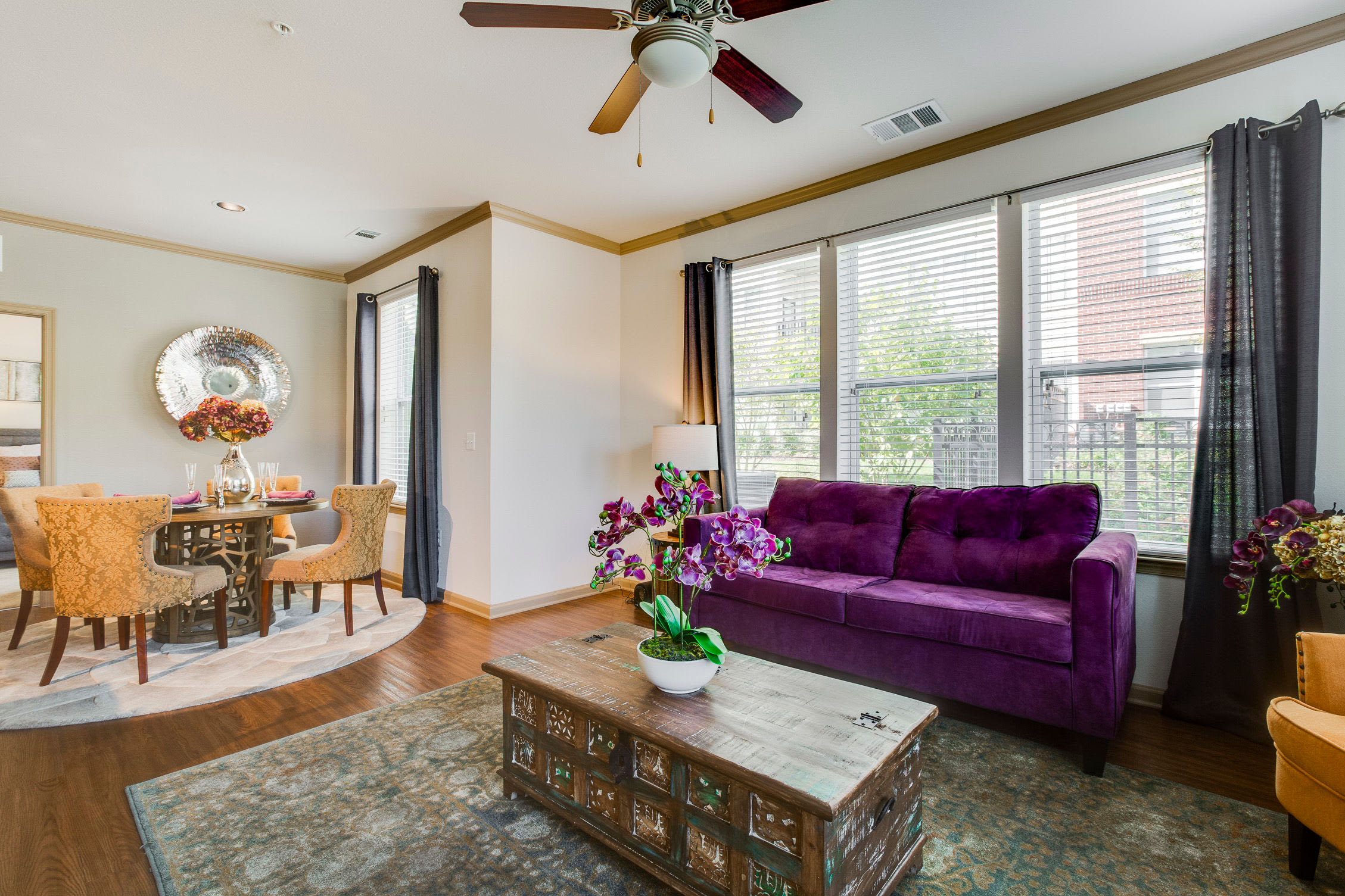 Spacious living room with wood flooring at Summerfield at Morgan Metro in Hyattsville, Maryland