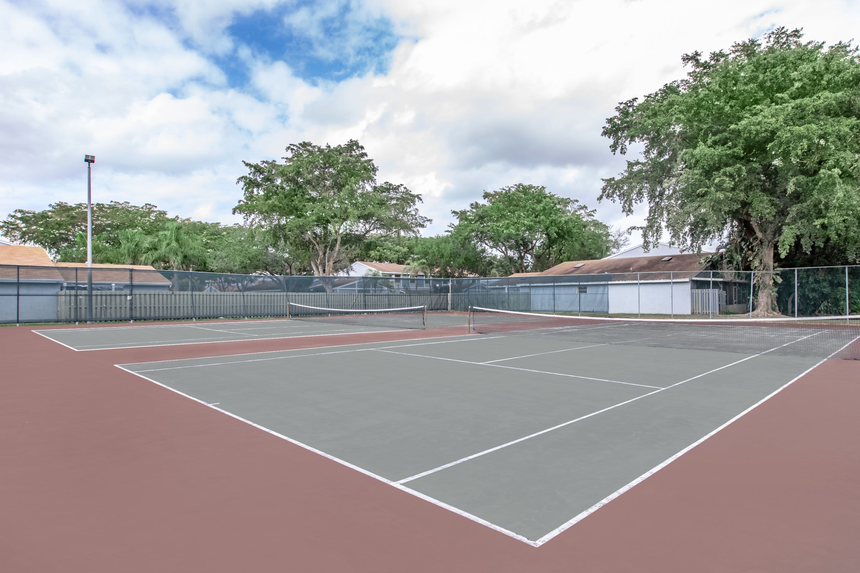 View amenities like our tennis court at Sunrise, Florida