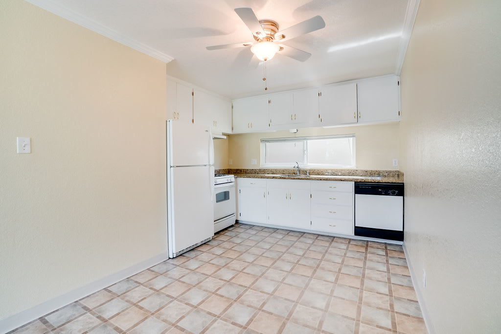 Model kitchen with tile floors at Bart Plaza in Castro Valley, California