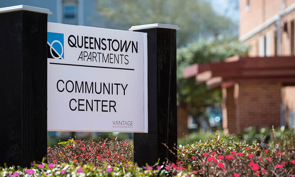 Community Center Sign At Queenstown Apartments 
