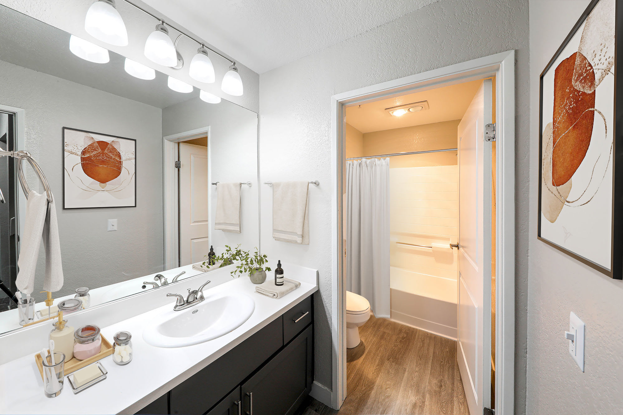 Modern finishes in an apartment bathroom at The Retreat in Santa Clarita, California