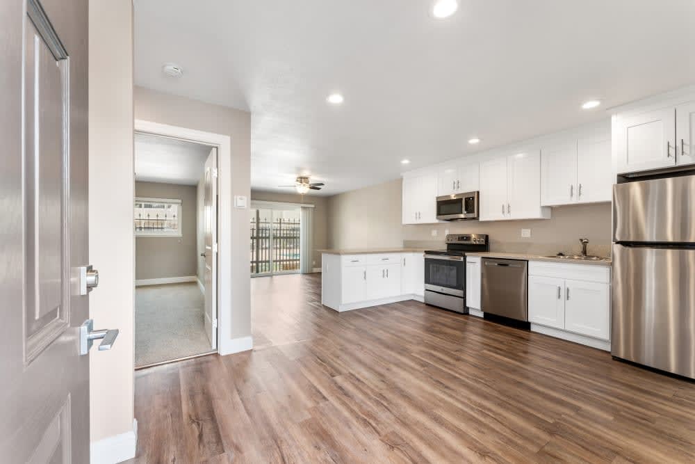 Wood-floor kitchen at Fremont Arms Apartments in Fremont, California