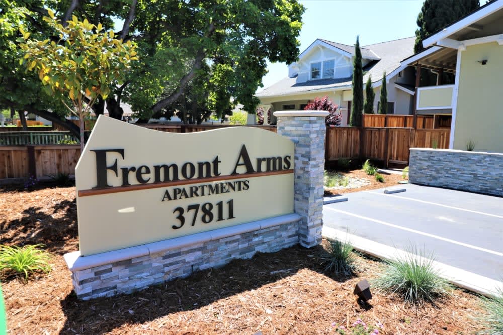 Exterior sign at Fremont Arms Apartments in Fremont, California
