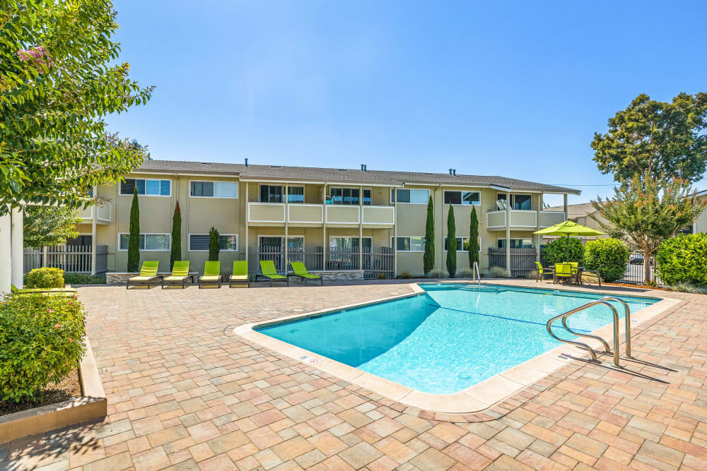 Luxury swimming pool at Fremont Arms Apartments in Fremont, California