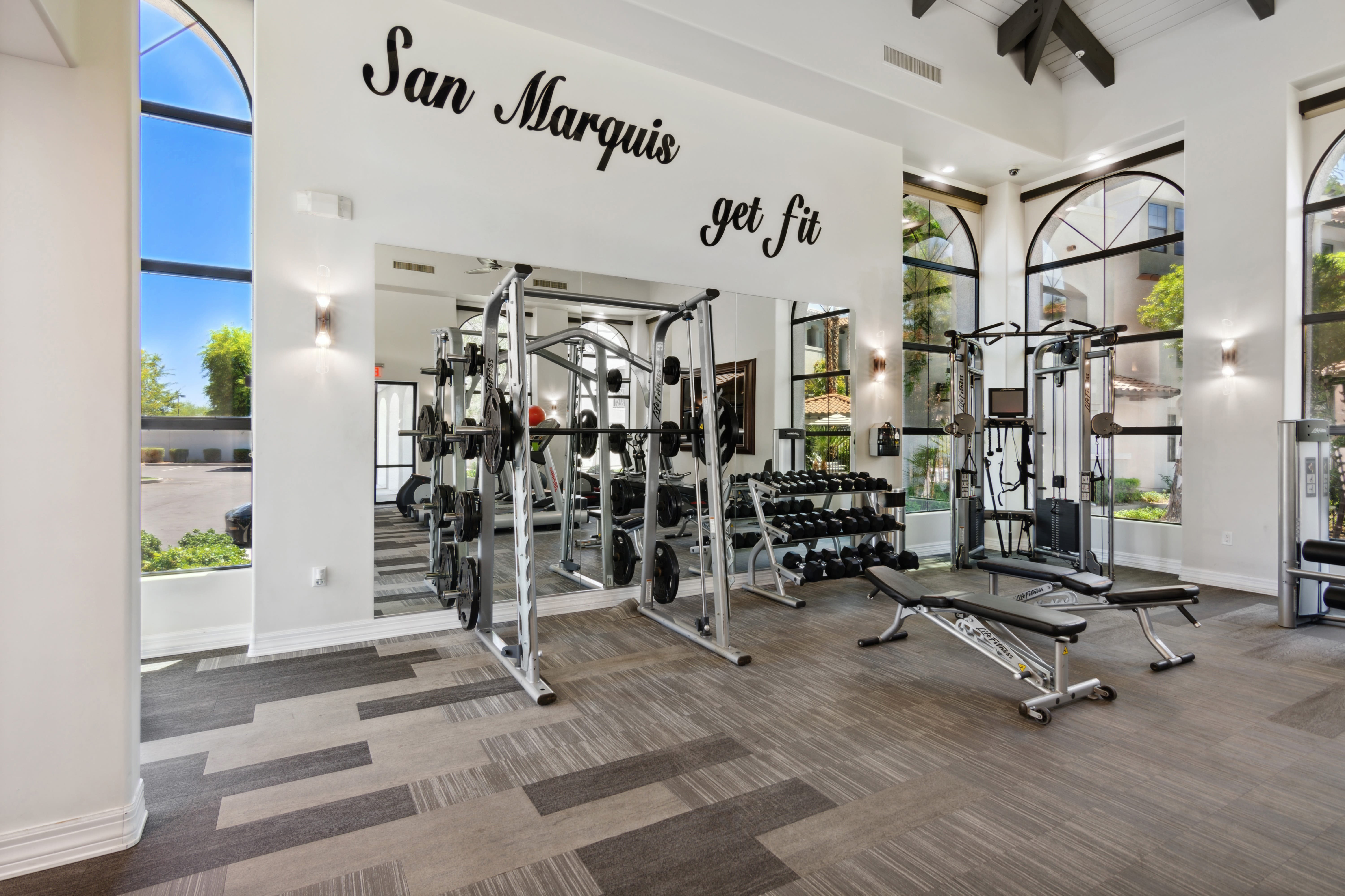 Fitness center with free weights at San Marquis in Tempe, Arizona