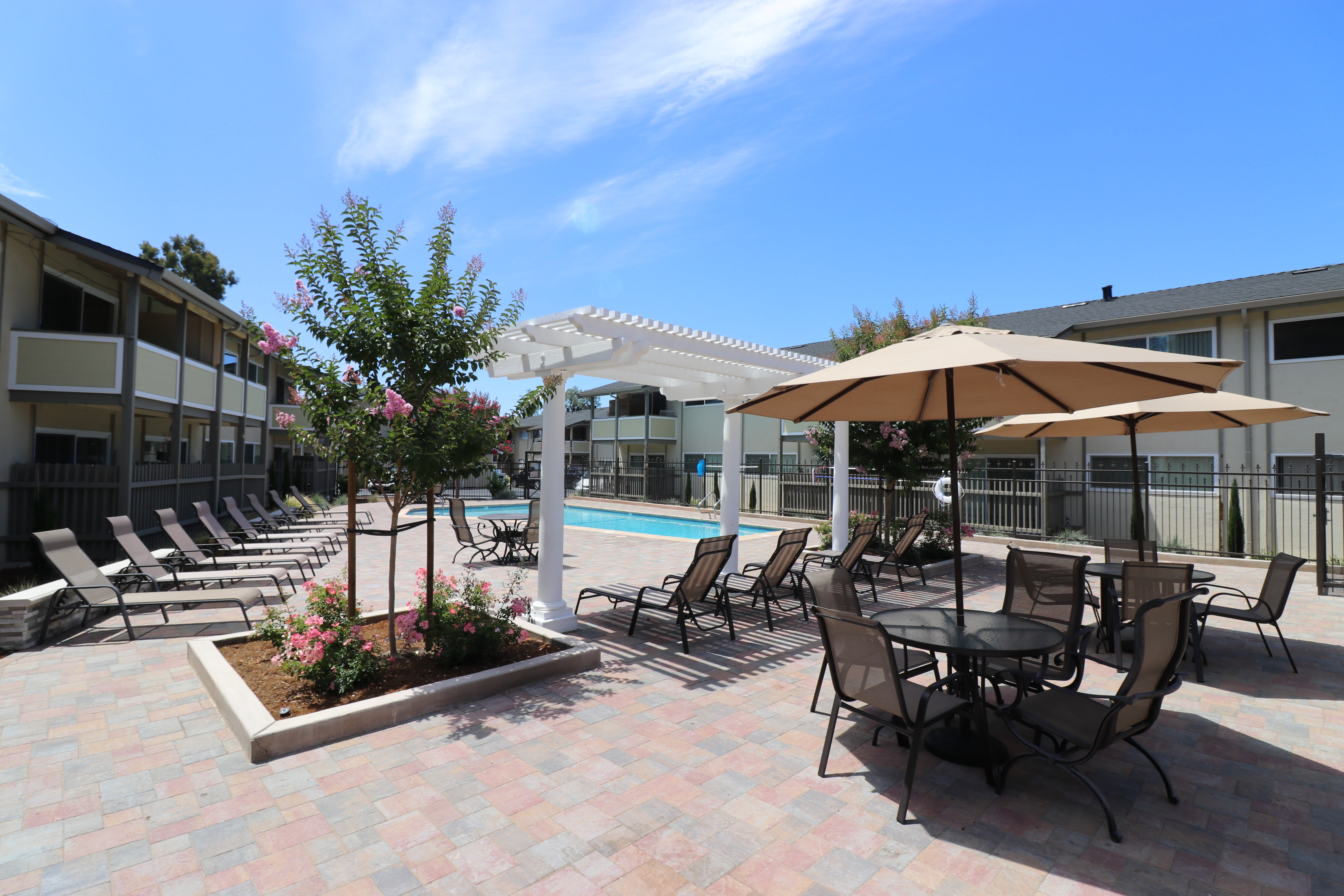 Comfortable spaces to relax on the courtyard at Fremont Arms Apartments in Fremont, California