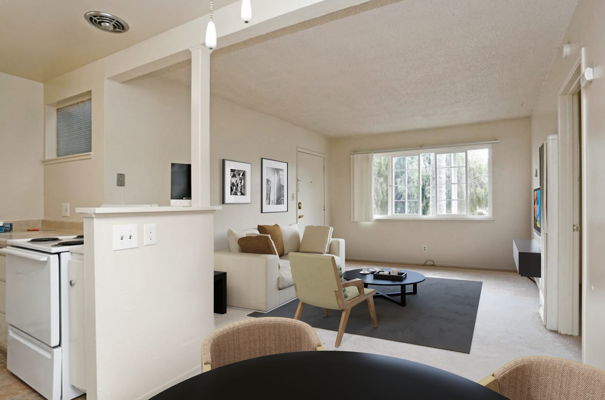 Spacious kitchen and living room at Coronado Apartments in Fremont, California