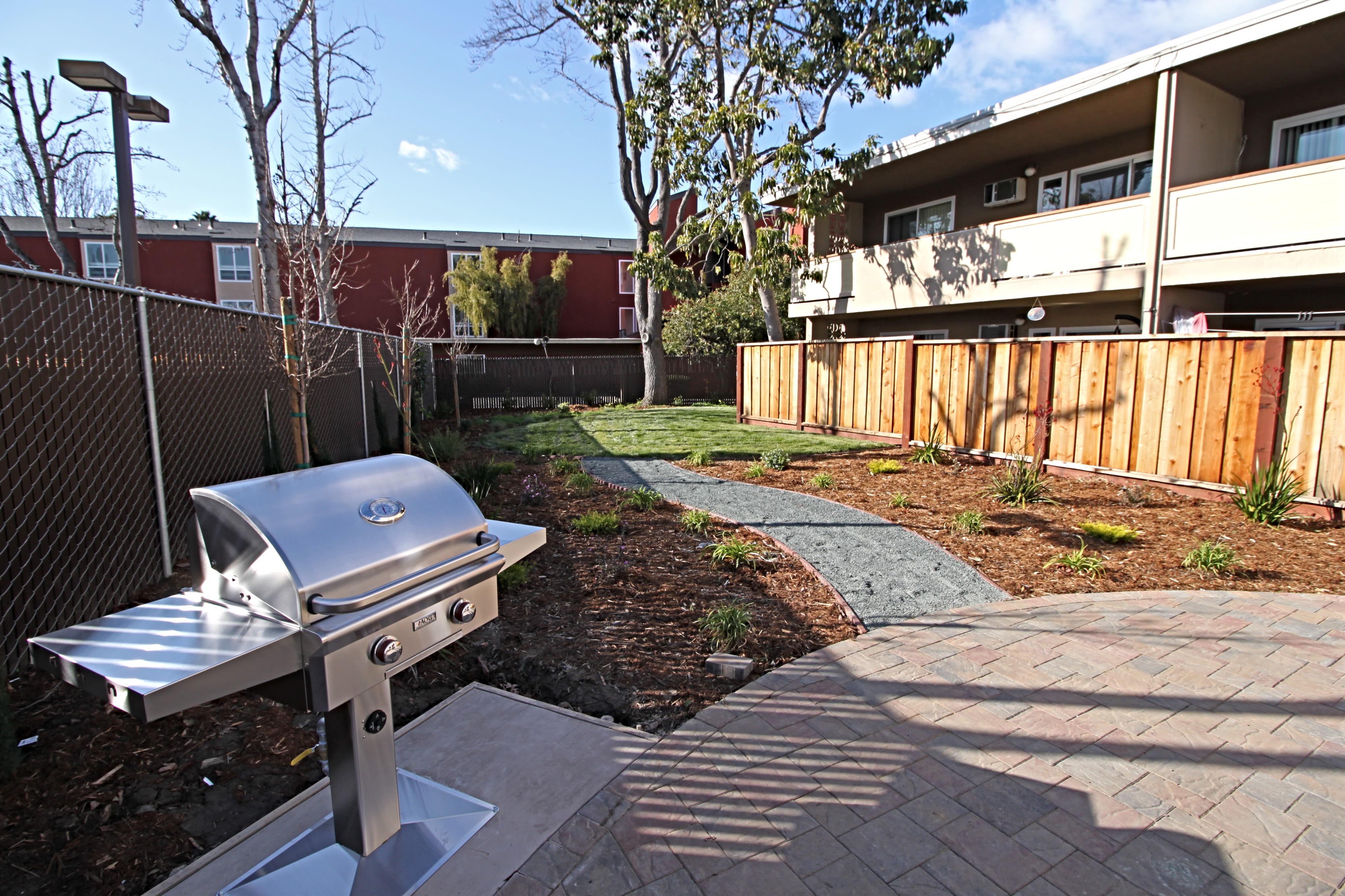 Pristine grills in the courtyard at Coronado Apartments in Fremont, California