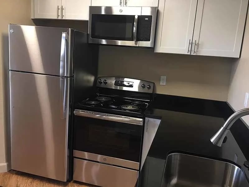 Stainless steel appliance kitchen at Bridle Path Place Apartments in Stockton, California