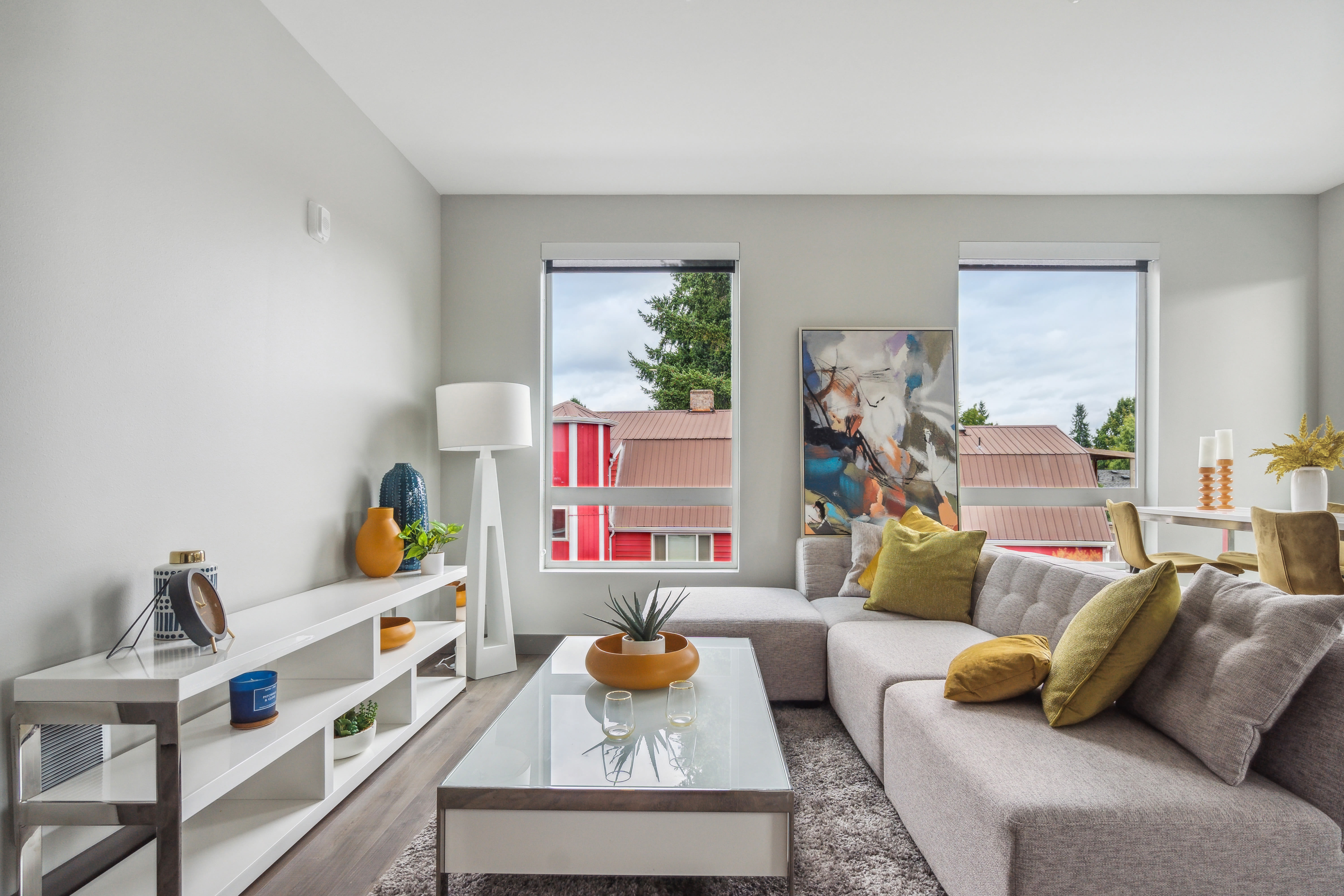 Modern living room with large windows at Alta Crossing in Marysville, Washington