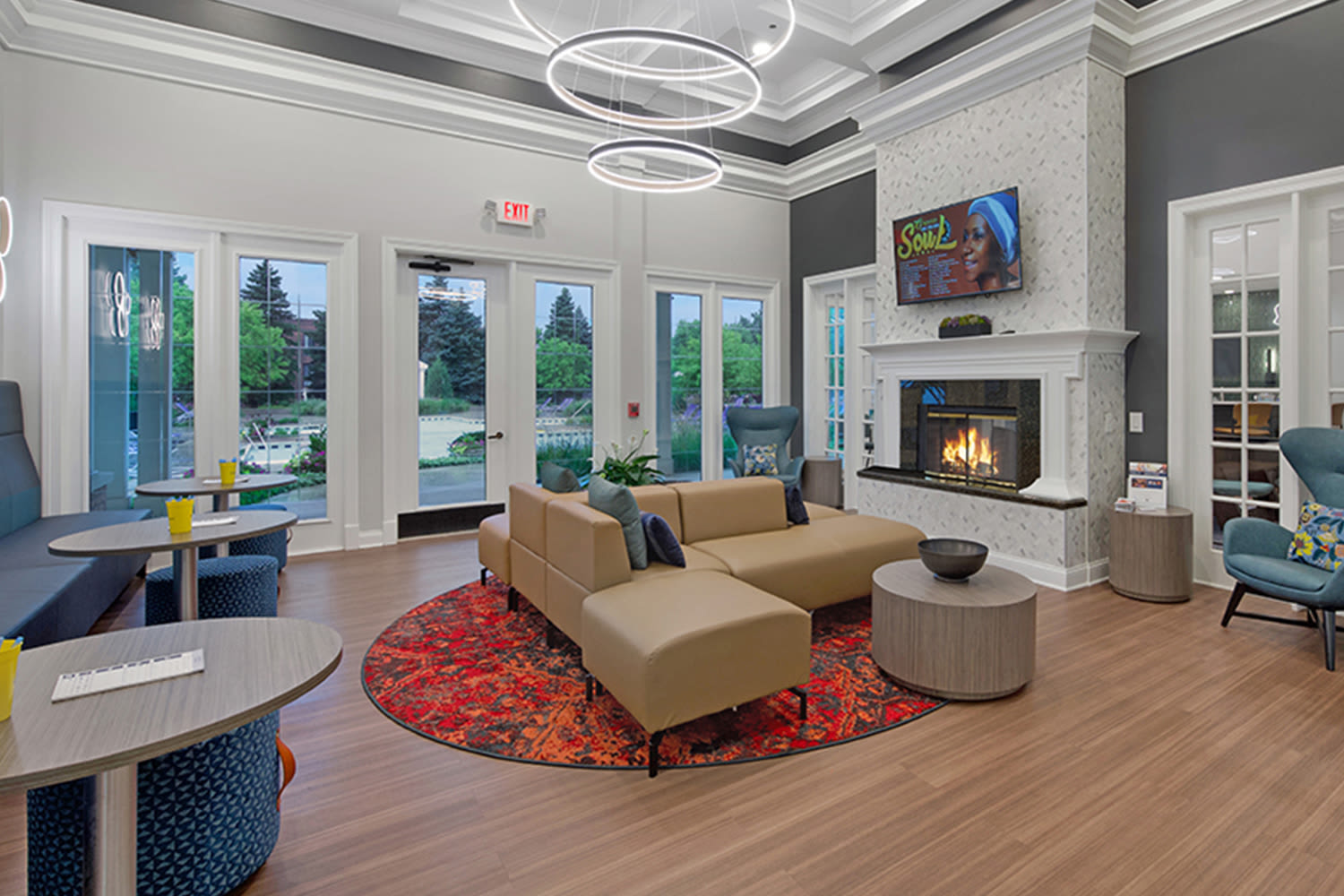 Clubhouse with a fireplace at Windsor Lakes Apartment Homes in Woodridge, Illinois