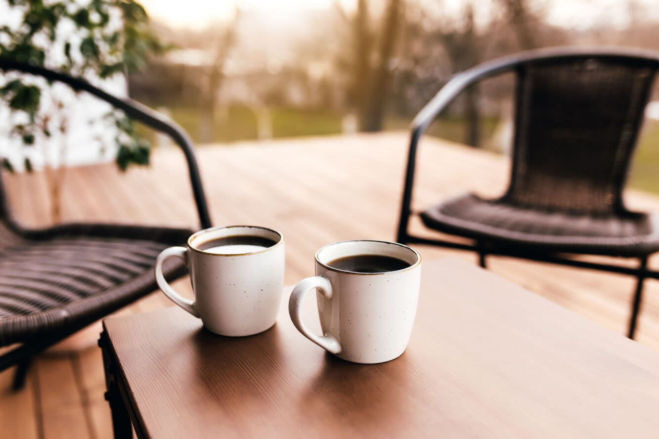 Coffee mugs set outside at Knowlton Apartment Homes in Mesquite, Texas